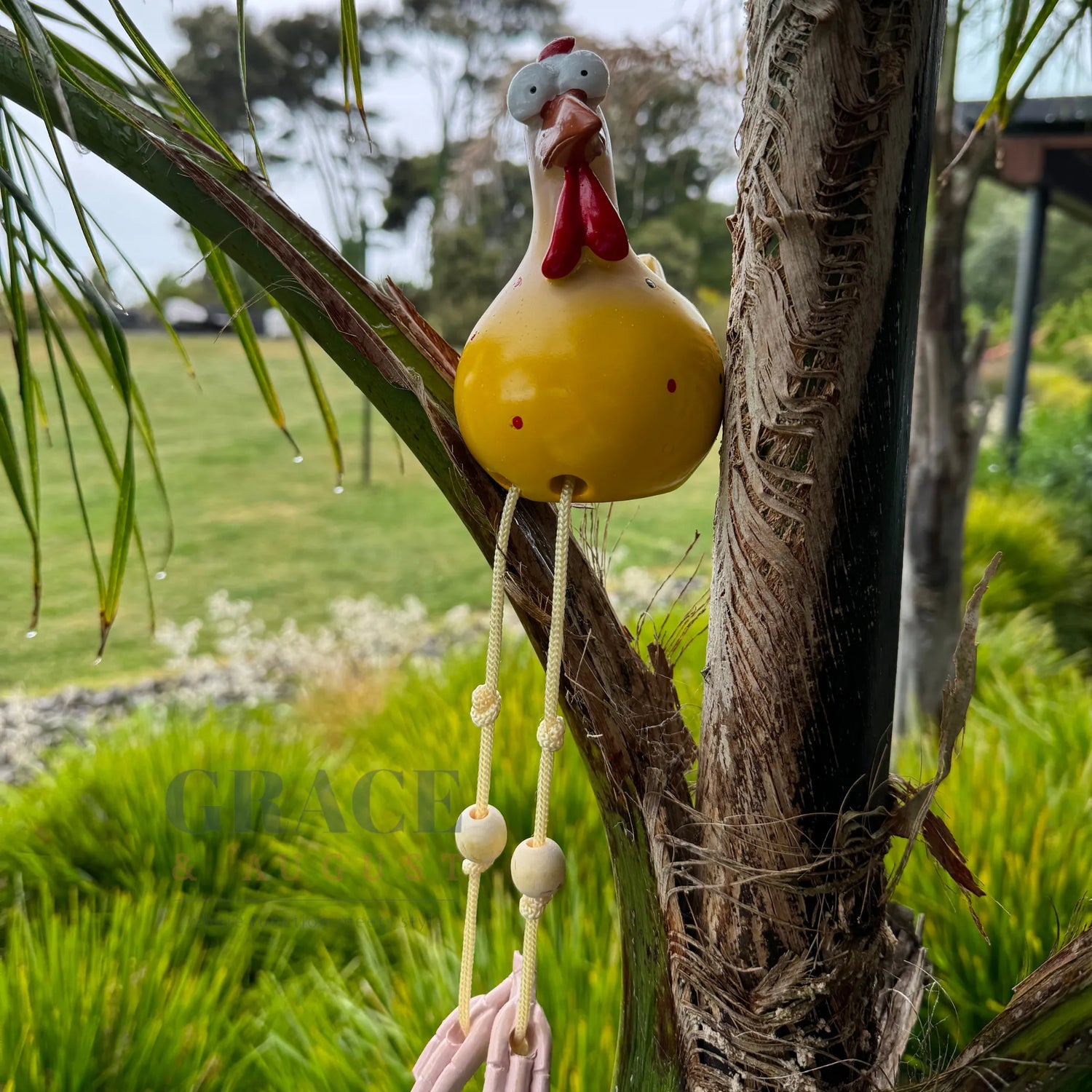 Playful chicken statue
