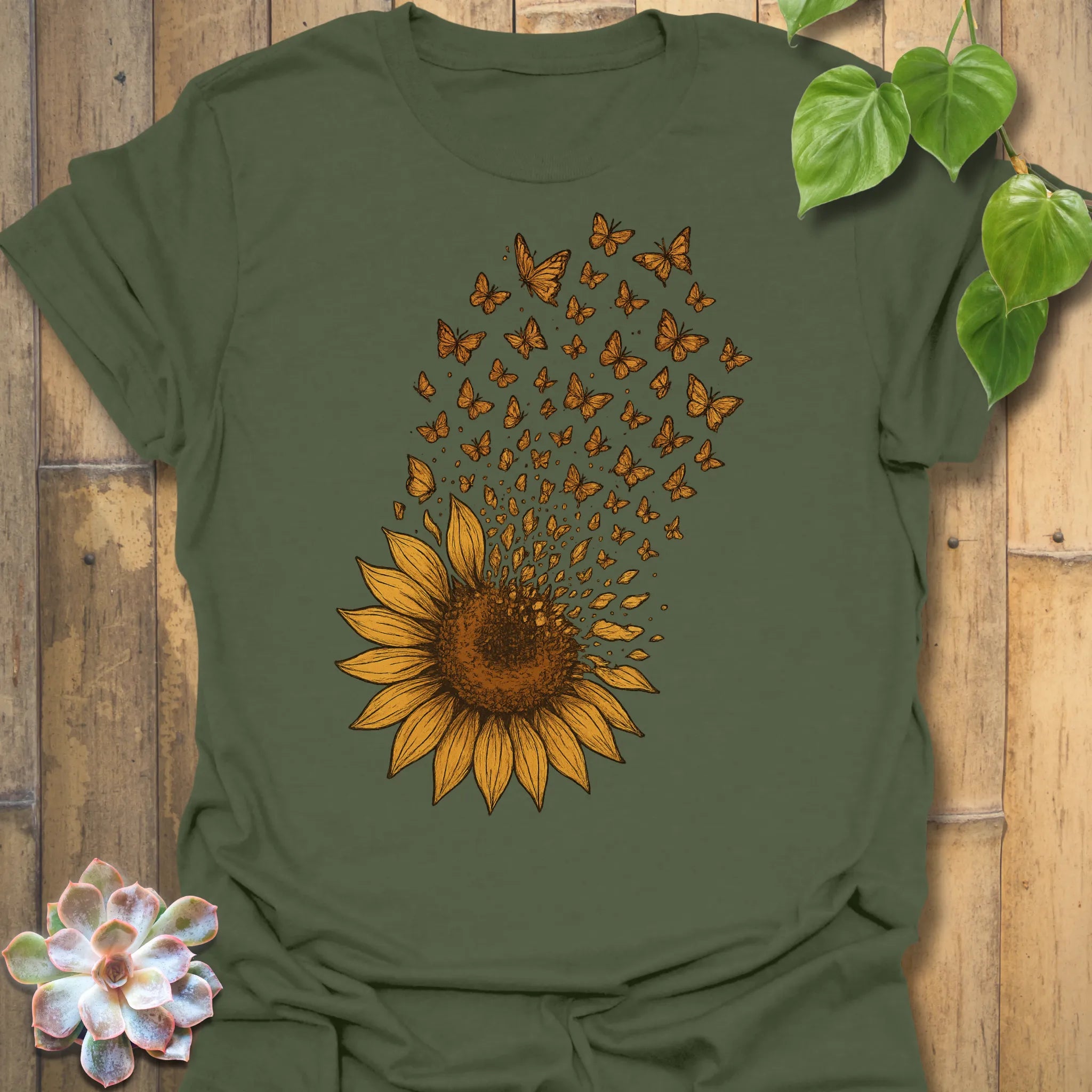 Bring nature’s strength to your wardrobe with our Sunflower Butterfly tee — earthy military green with a warm, uplifting sunflower-and-butterfly design.