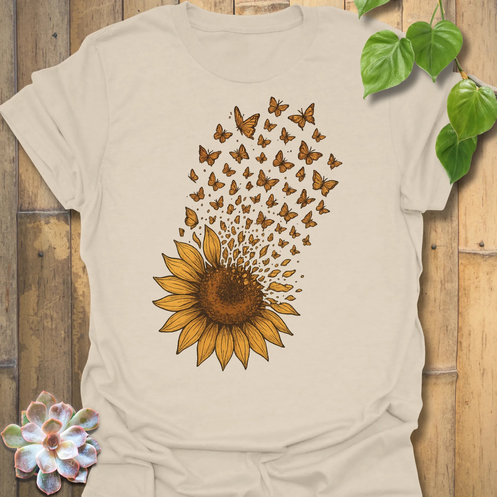 Soft and subtle, our Natural Sunflower Butterfly tee celebrates growth and renewal — a gentle neutral tone with a vibrant sunflower in flight.