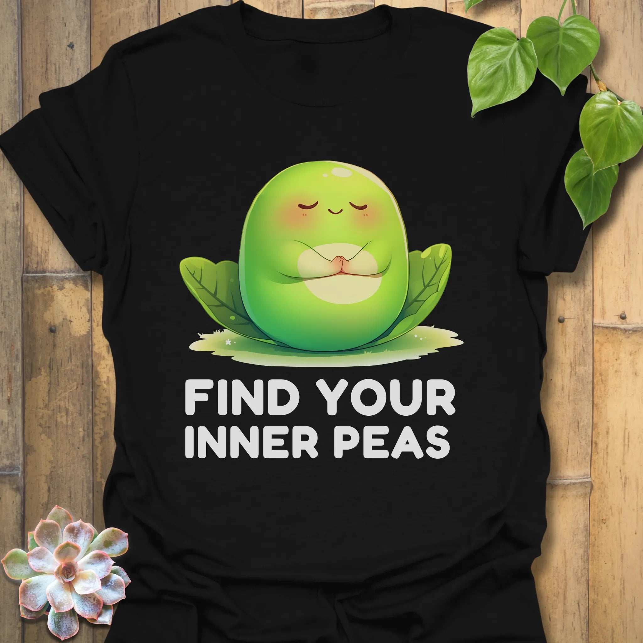 Black t-shirt featuring the design Find Your Inner Peas printed in bold green letters with playful pea graphics