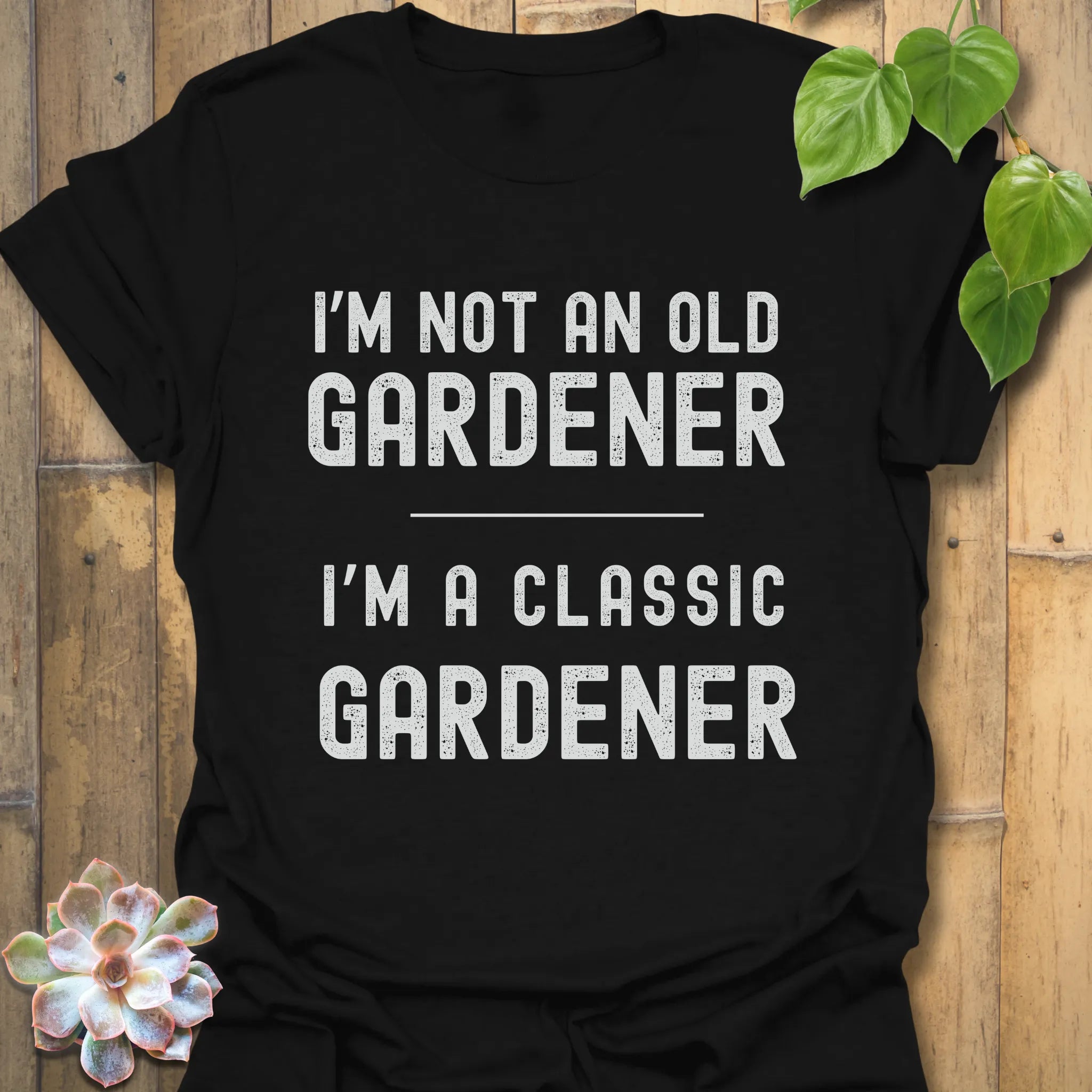 Black t-shirt featuring the design “I’m not an older gardener, I’m a classic gardener” funny gardening shirt.