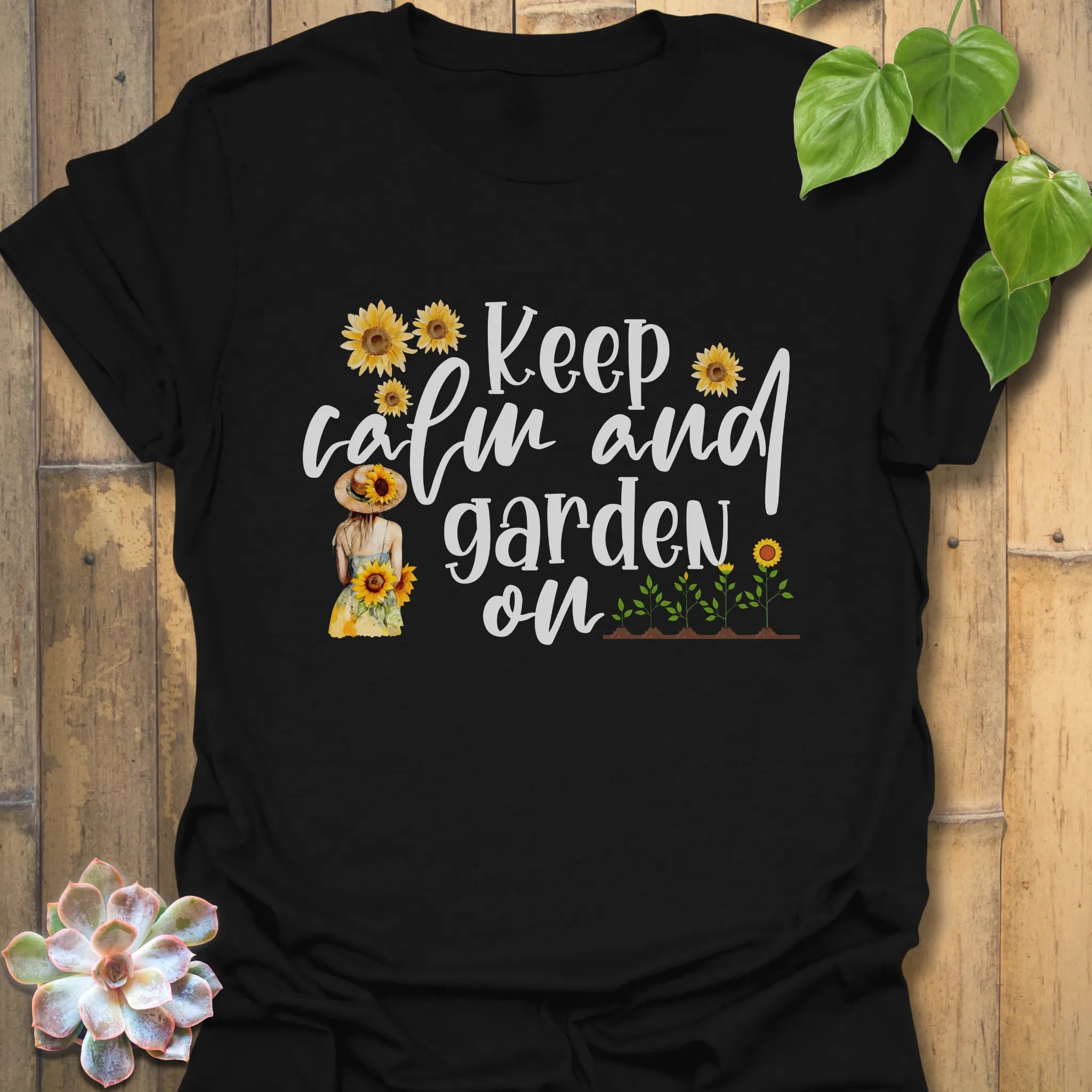 Black t-shirt featuring the design Keep Calm and Garden On, funny gardening tee.
