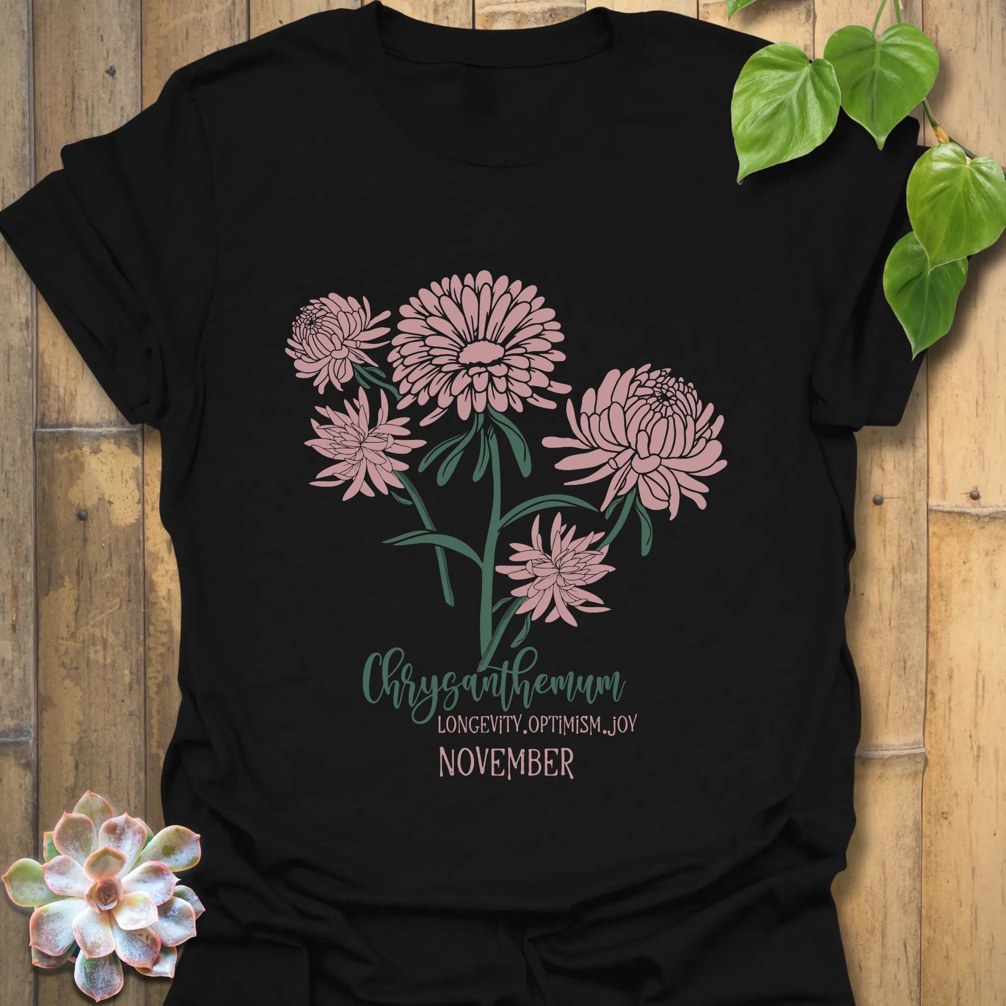 Black t-shirt featuring the design November Chrysanthemum with a detailed chrysanthemum flower print, versatile floral graphic tee for casual wear.