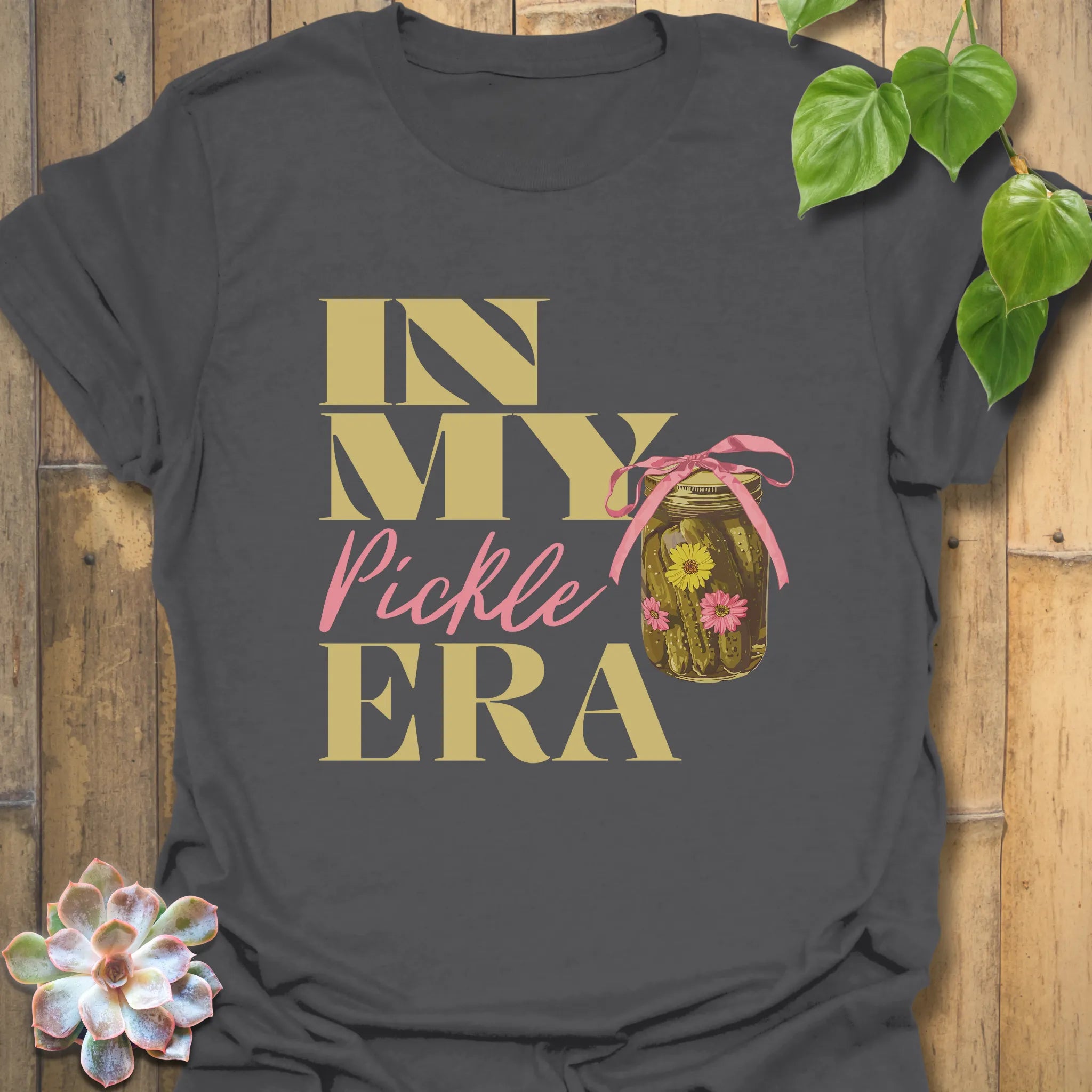 Charcoal grey t-shirt featuring the design “In My Pickle ERA” with cucumbers inside a glass jar