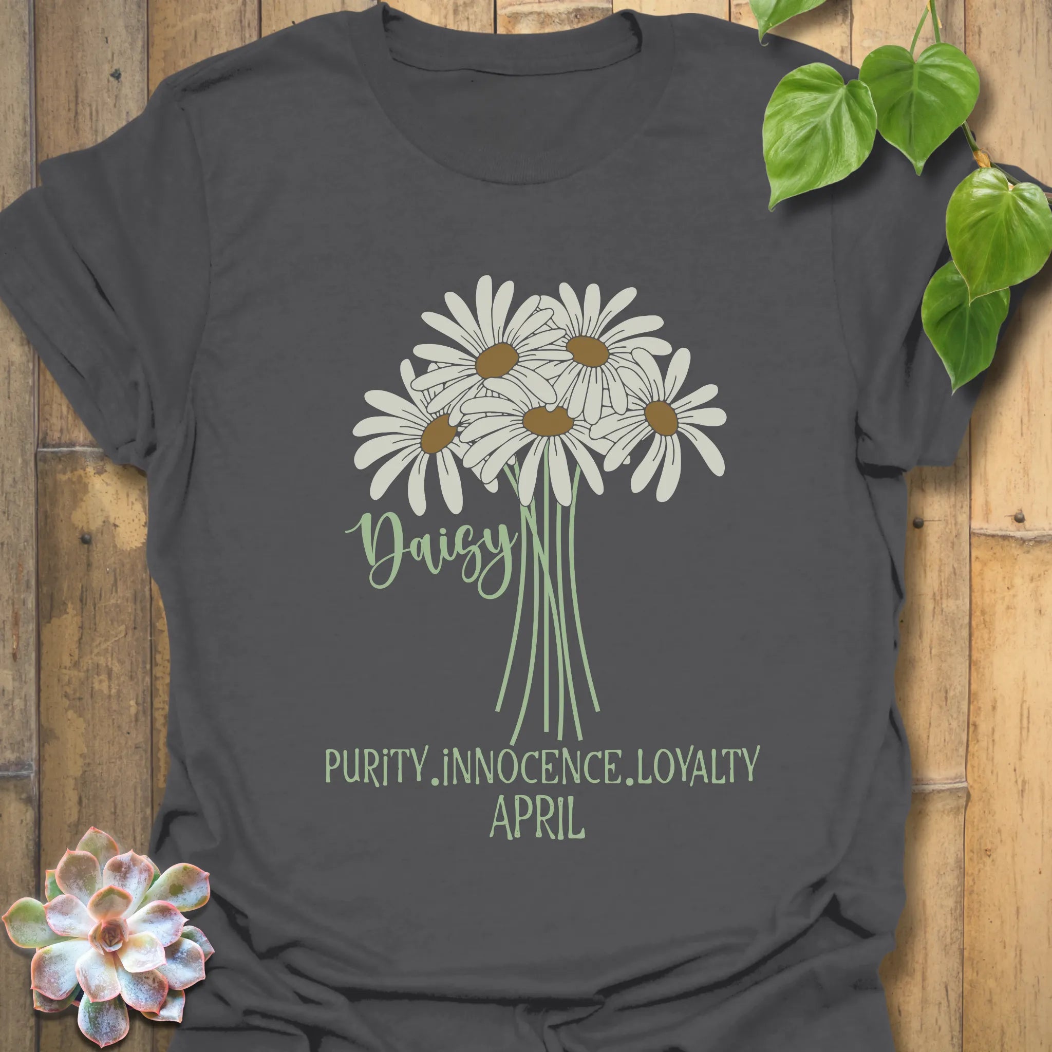 Charcoal t-shirt featuring the design April Daisy with a print of rose flower, a trendy botanical graphic tee for flower lovers.