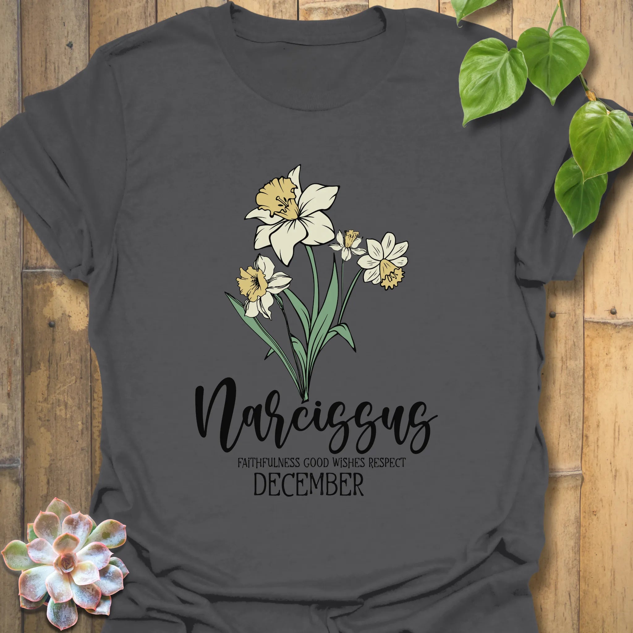 Charcoal t-shirt featuring the design December Narcissus printed with a narcissus flower, a stylish floral print t-shirt with a modern touch