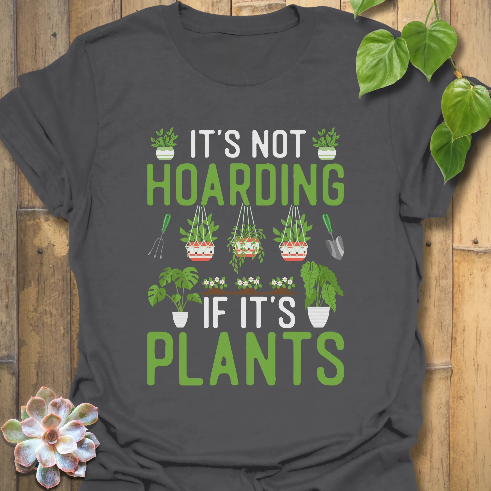 Charcoal t-shirt featuring the design It’s Not Hoarding If It’s Plant with plant lover graphic.