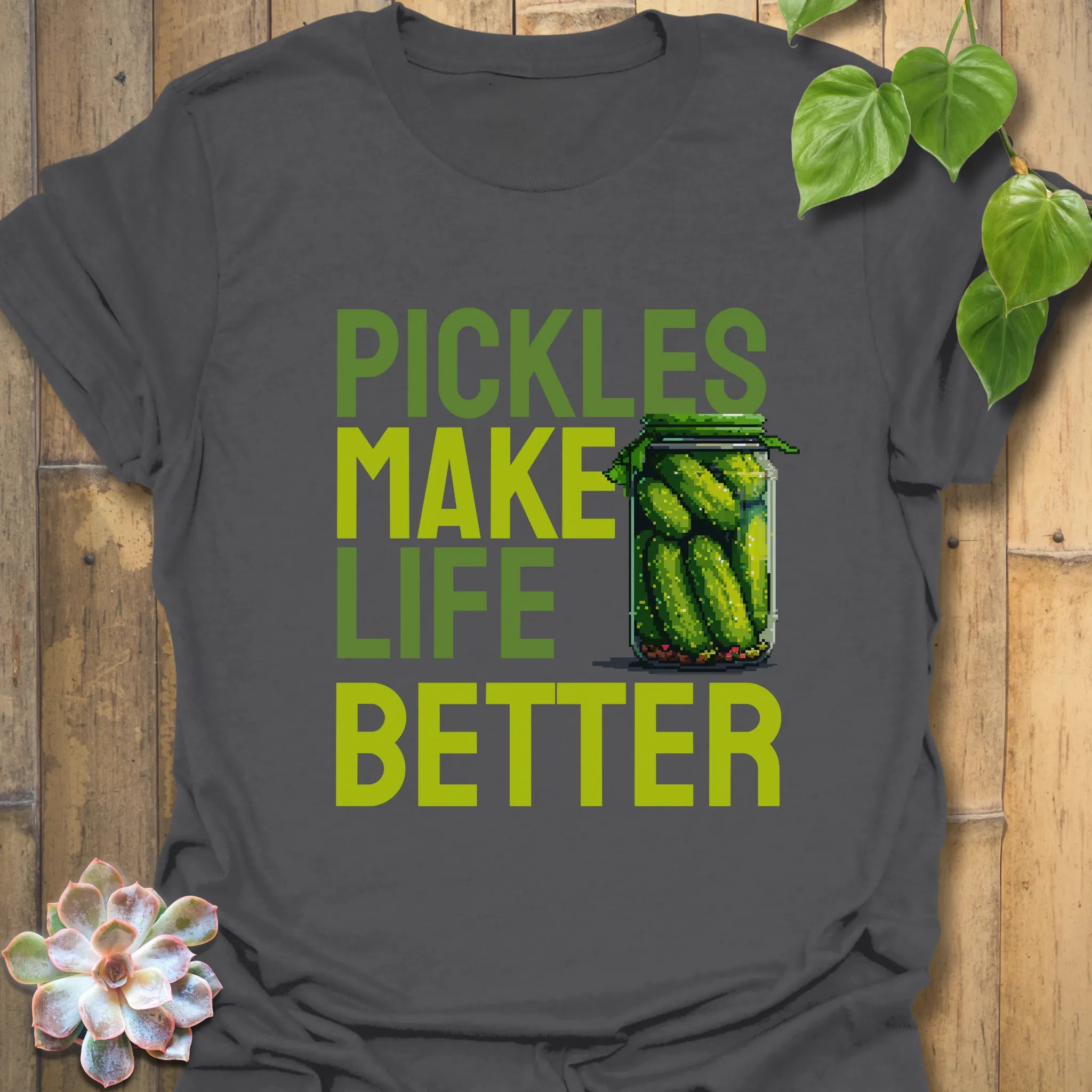 Charcoal t-shirt featuring the design “Pickles make life better” with cucumbers inside a glass jar