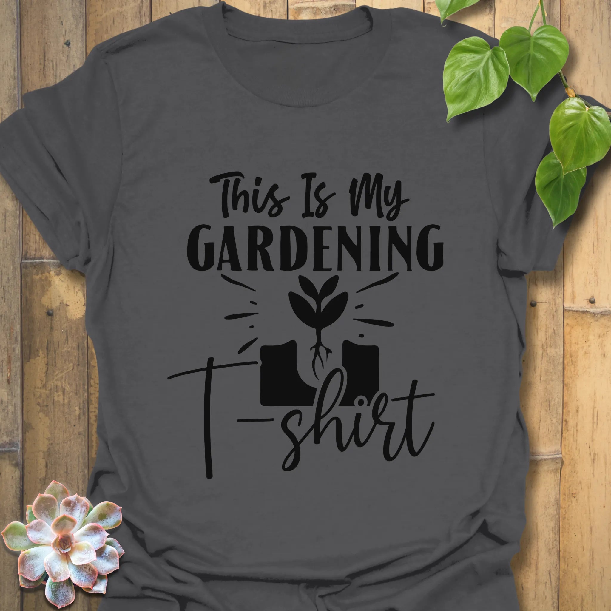 Charcoal t-shirt featuring the design This Is My Gardening T-shirt printed in bold lettering, a funny garden tee for plant lovers and outdoor hobbyists.
