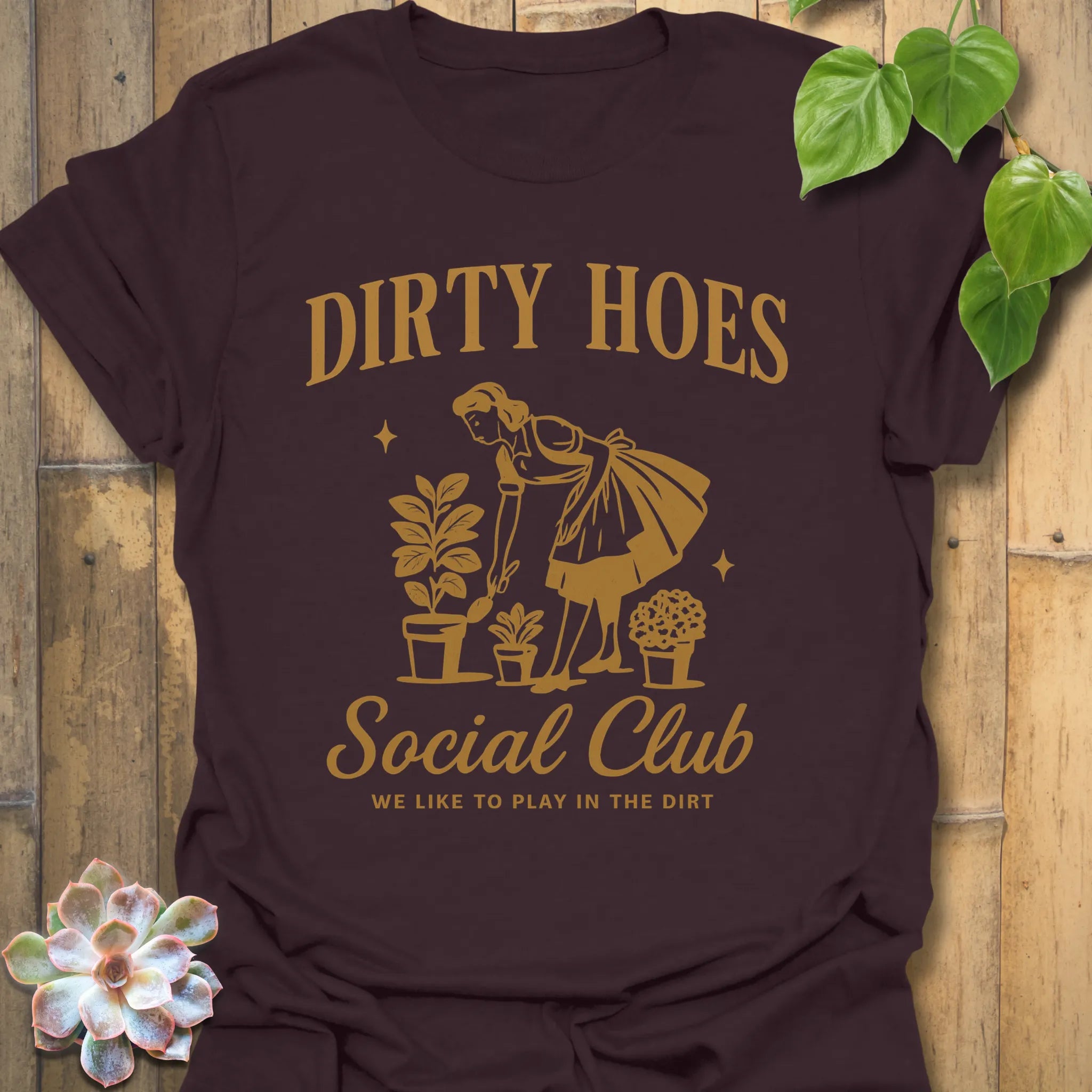 Dark Chocolate t-shirt featuring the design Dirty Hoes printed in bold letters, gardening graphic tee.