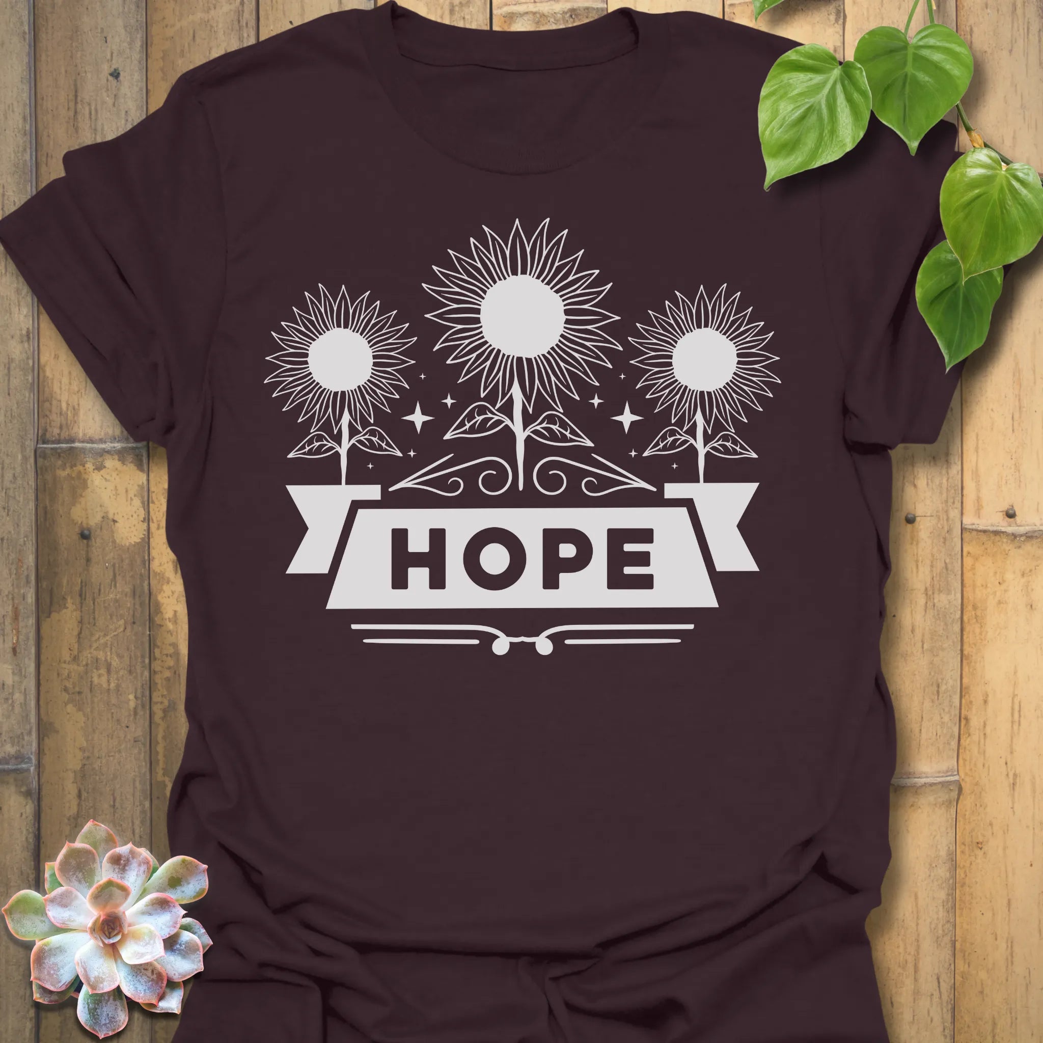 Dark Chocolate t-shirt featuring the design Hope printed in sunflower and bold letters, positive vibe t-shirt.