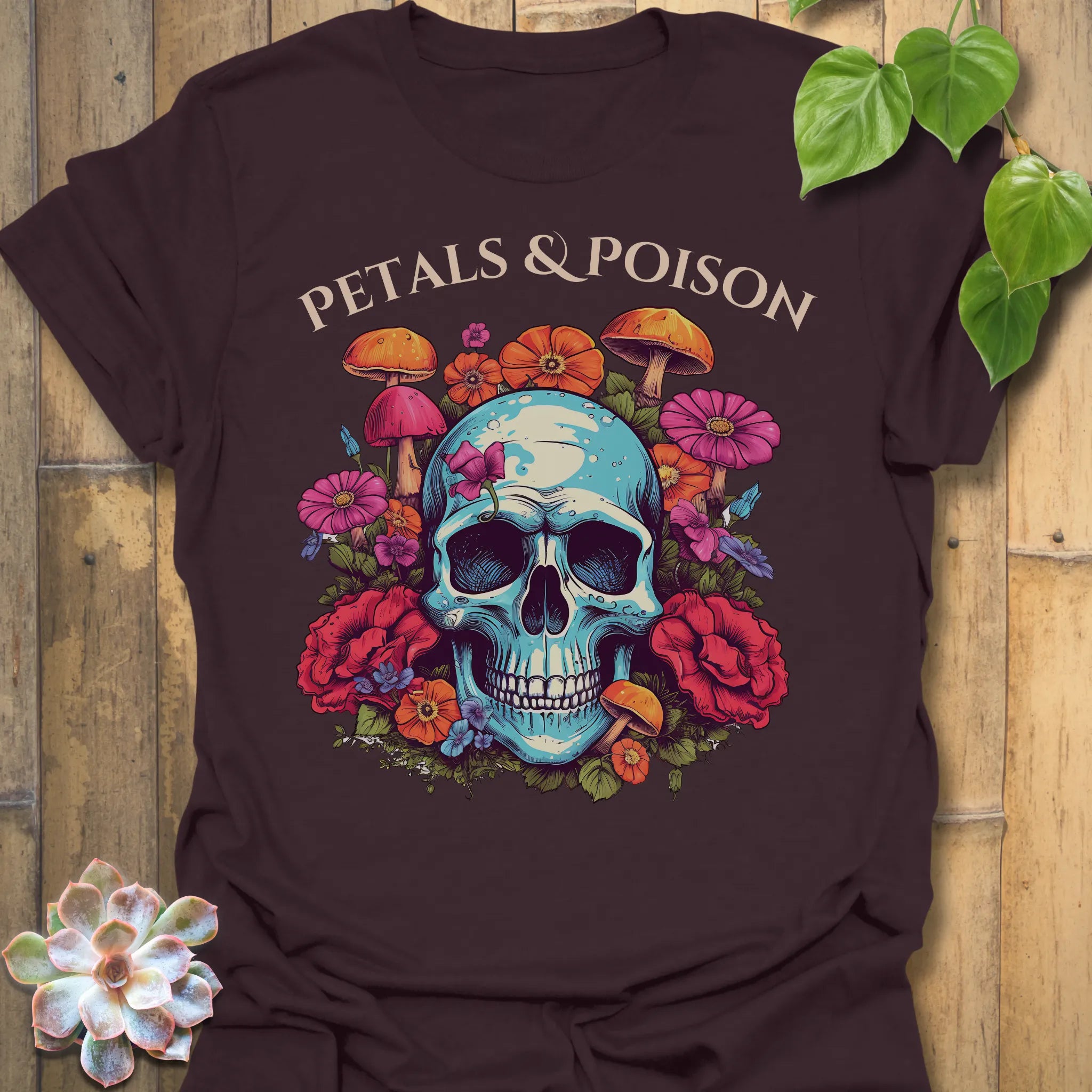 Dark Chocolate t-shirt featuring the design Petals & Poison printed in bold letters, gothic floral shirt.