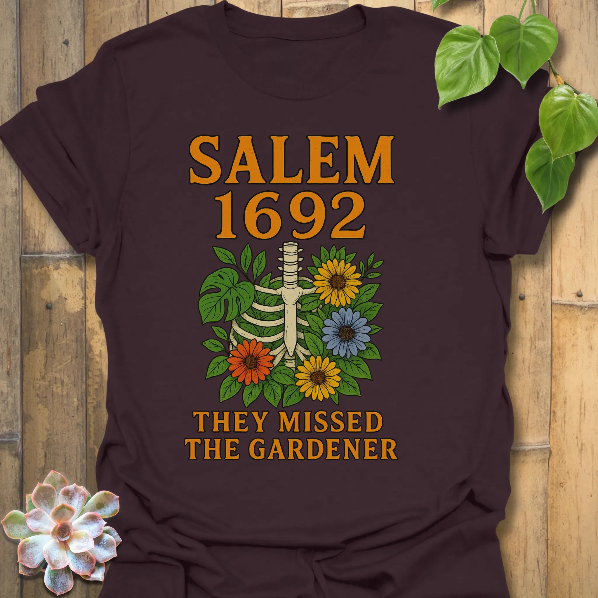 Dark Chocolate t-shirt featuring the design Salem 1692 printed in bold letters, vintage halloween graphic tee.