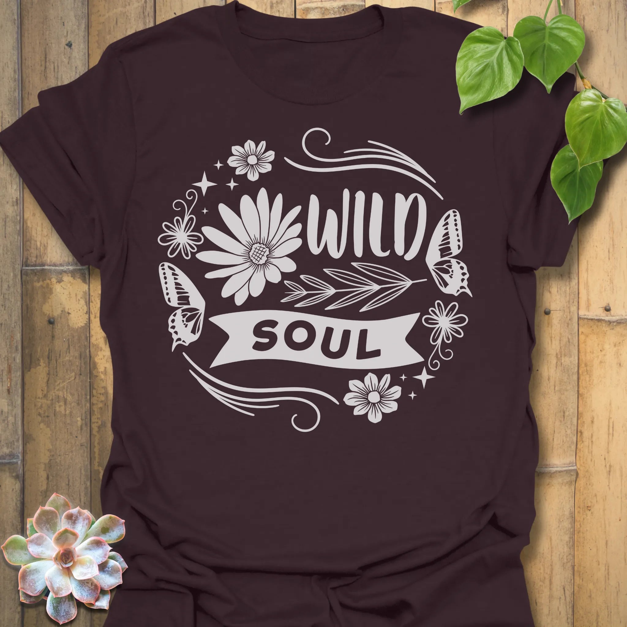 Dark Chocolate t-shirt featuring the design Wild Soul printed in bold black letters, floral graphic tee.