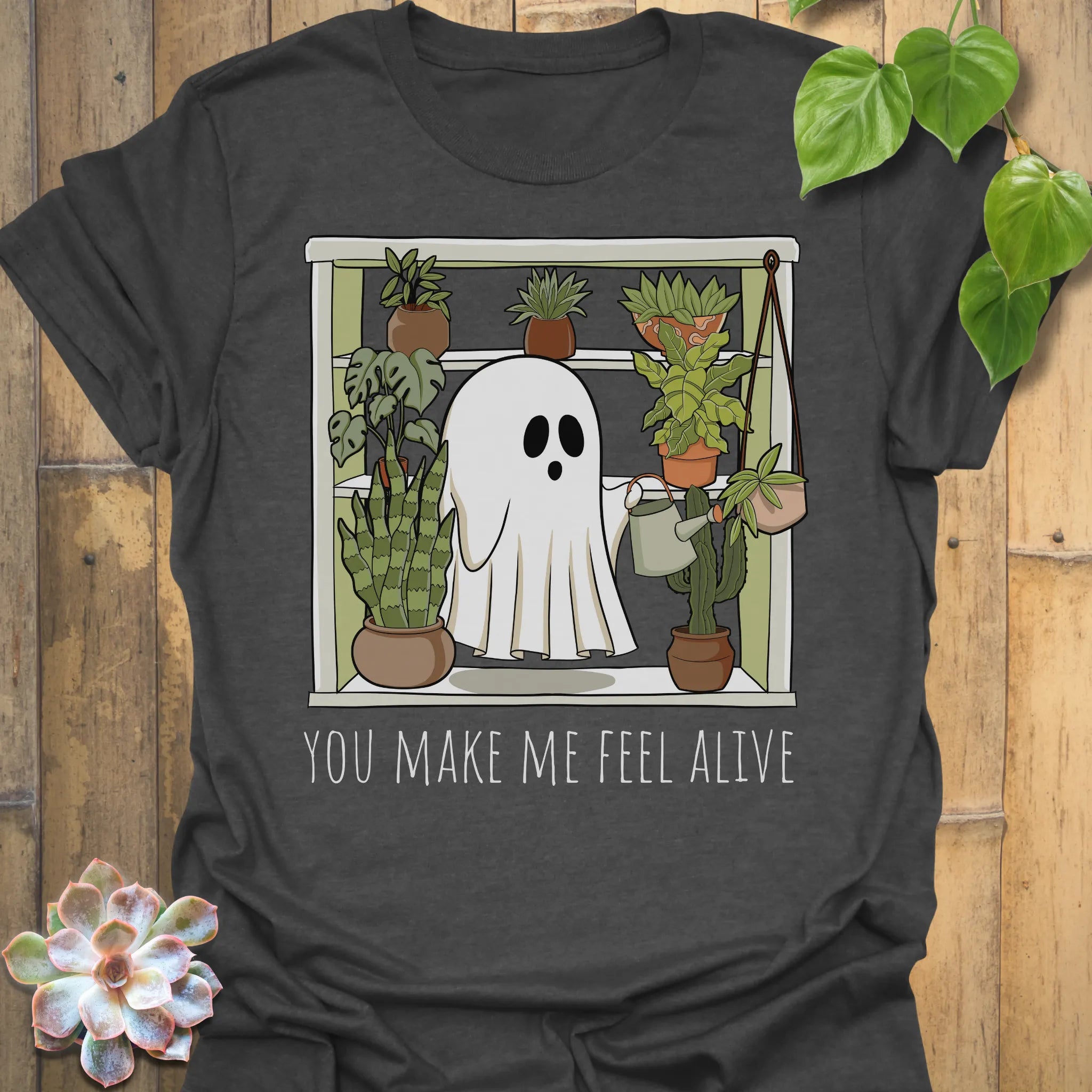 Dark Heather t-shirt featuring the design Feel Alive printed halloween motivational graphic tee.