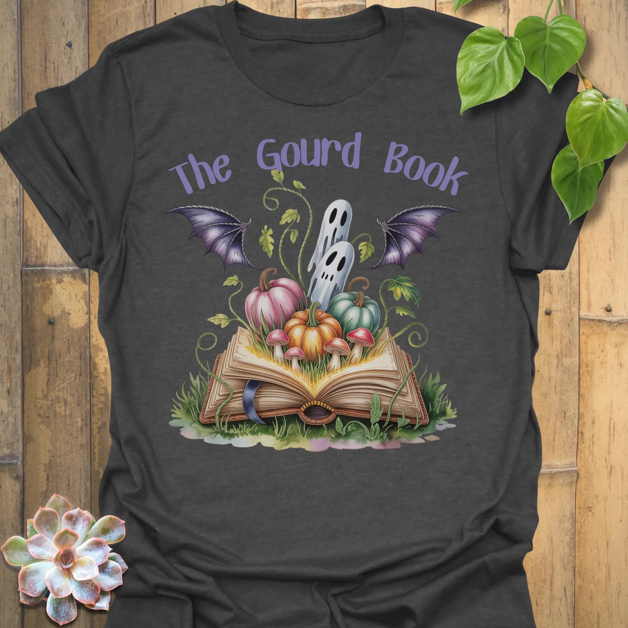 Dark Heather t-shirt featuring the design The Gourd Book printed in halloween pumpkin shirt.
