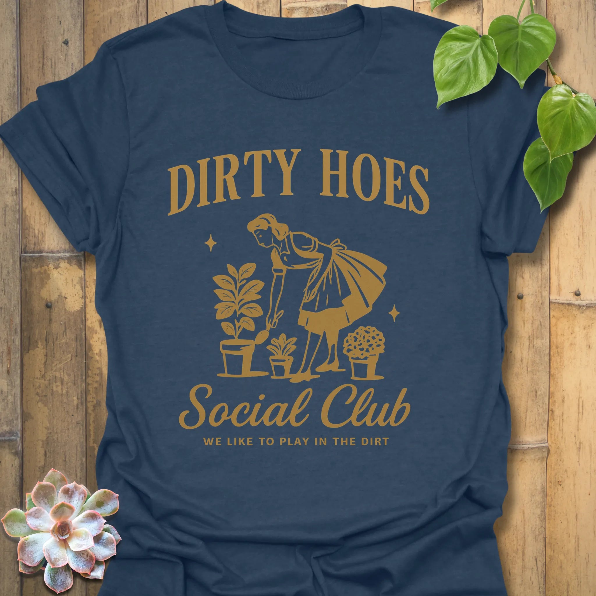 Heather Navy t-shirt featuring the design Dirty Hoes printed in bold letters, gardening graphic tee.