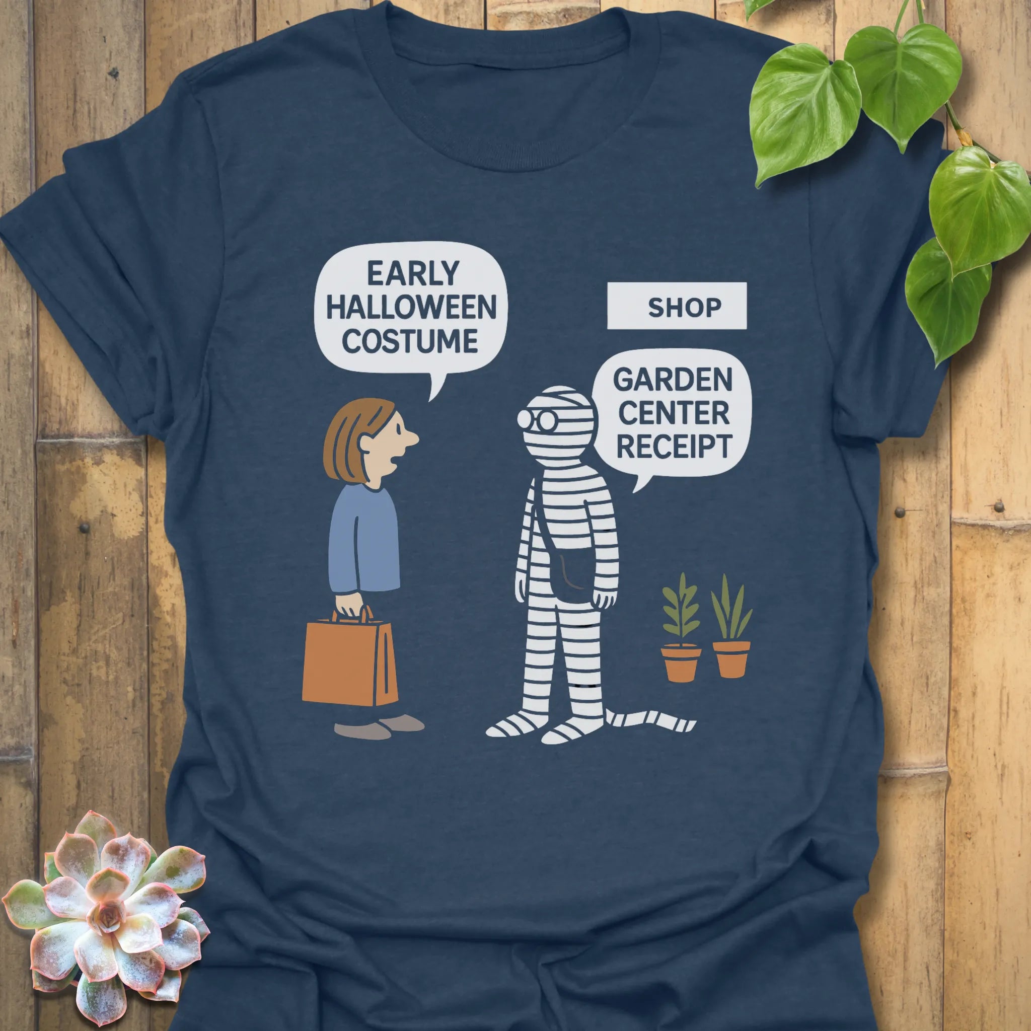Heather Navy t-shirt featuring the design Halloween Costume printed in bold letters, stylish Halloween top.