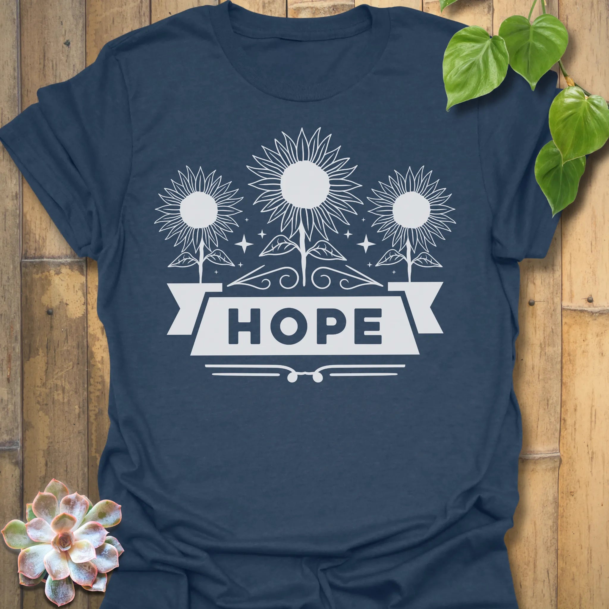 Heather Navy t-shirt featuring the design Hope printed in sunflower and bold letters, positive vibe t-shirt.