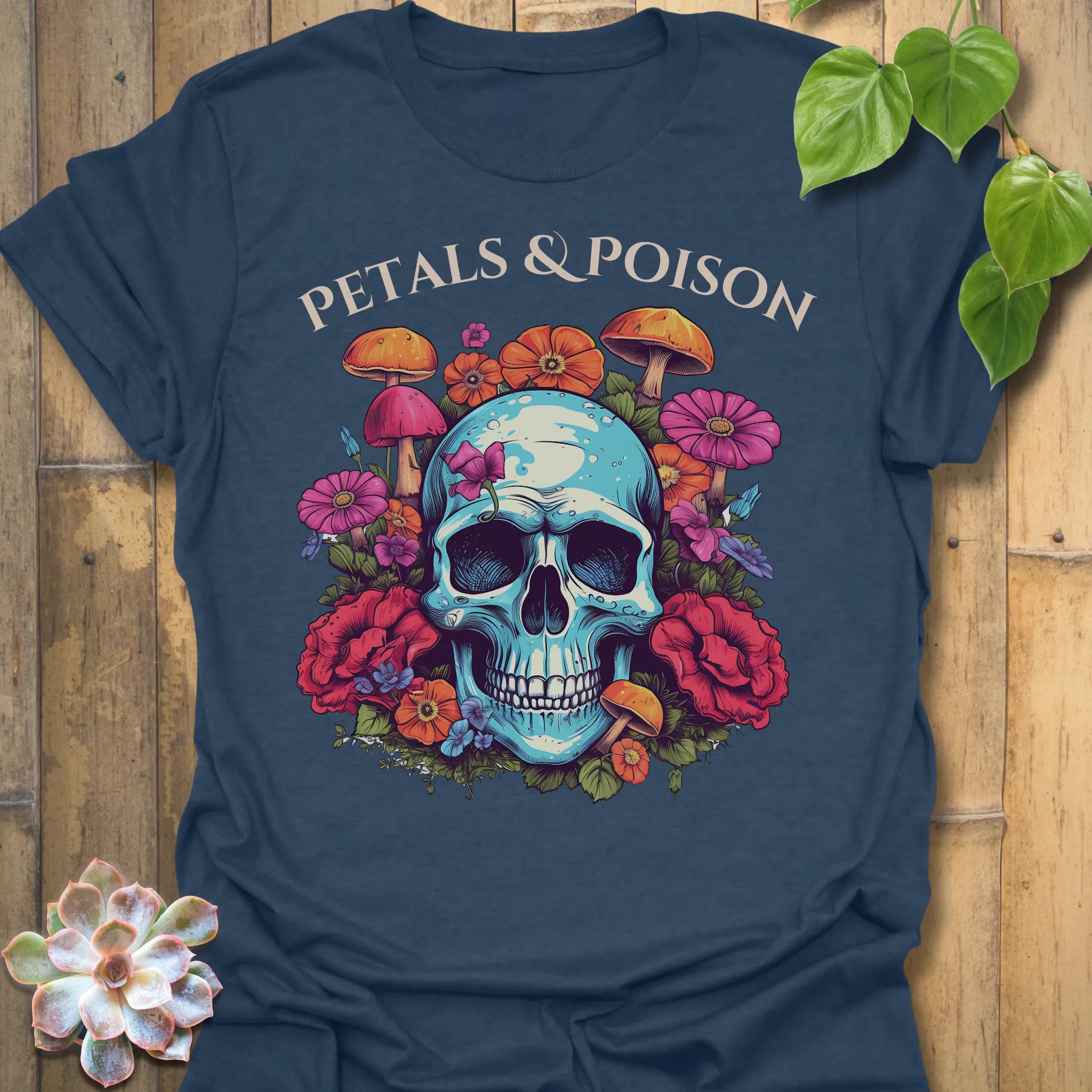 Heather Navy t-shirt featuring the design Petals & Poison printed in bold letters, gothic floral shirt.