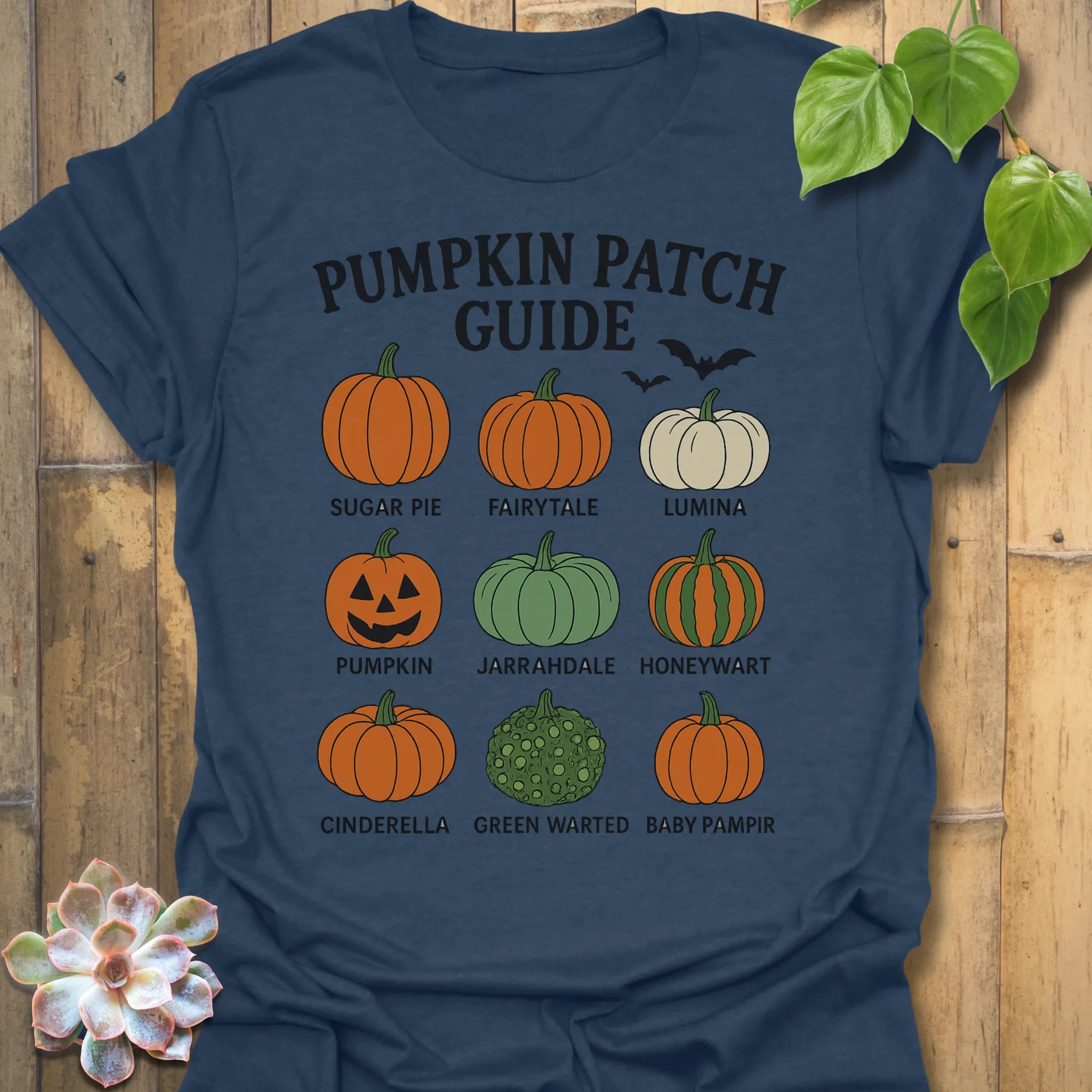 Heather Navy t-shirt featuring the design Pumpkin Patch Guide printed in black letters, Halloween pumpkin tee.