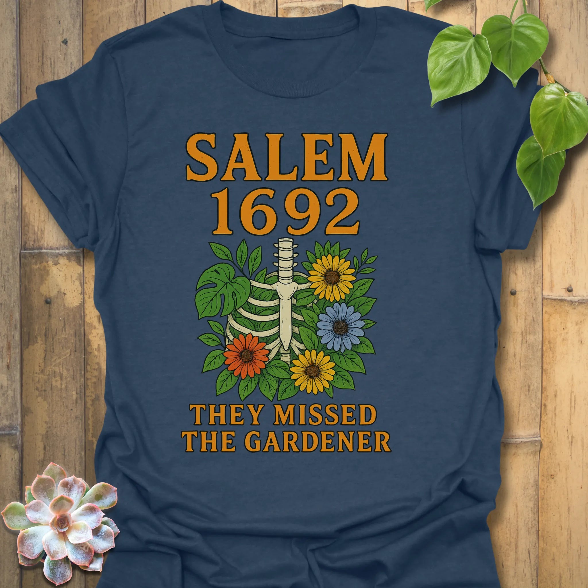 Heather Navy t-shirt featuring the design Salem 1692 printed in bold letters, vintage halloween graphic tee.