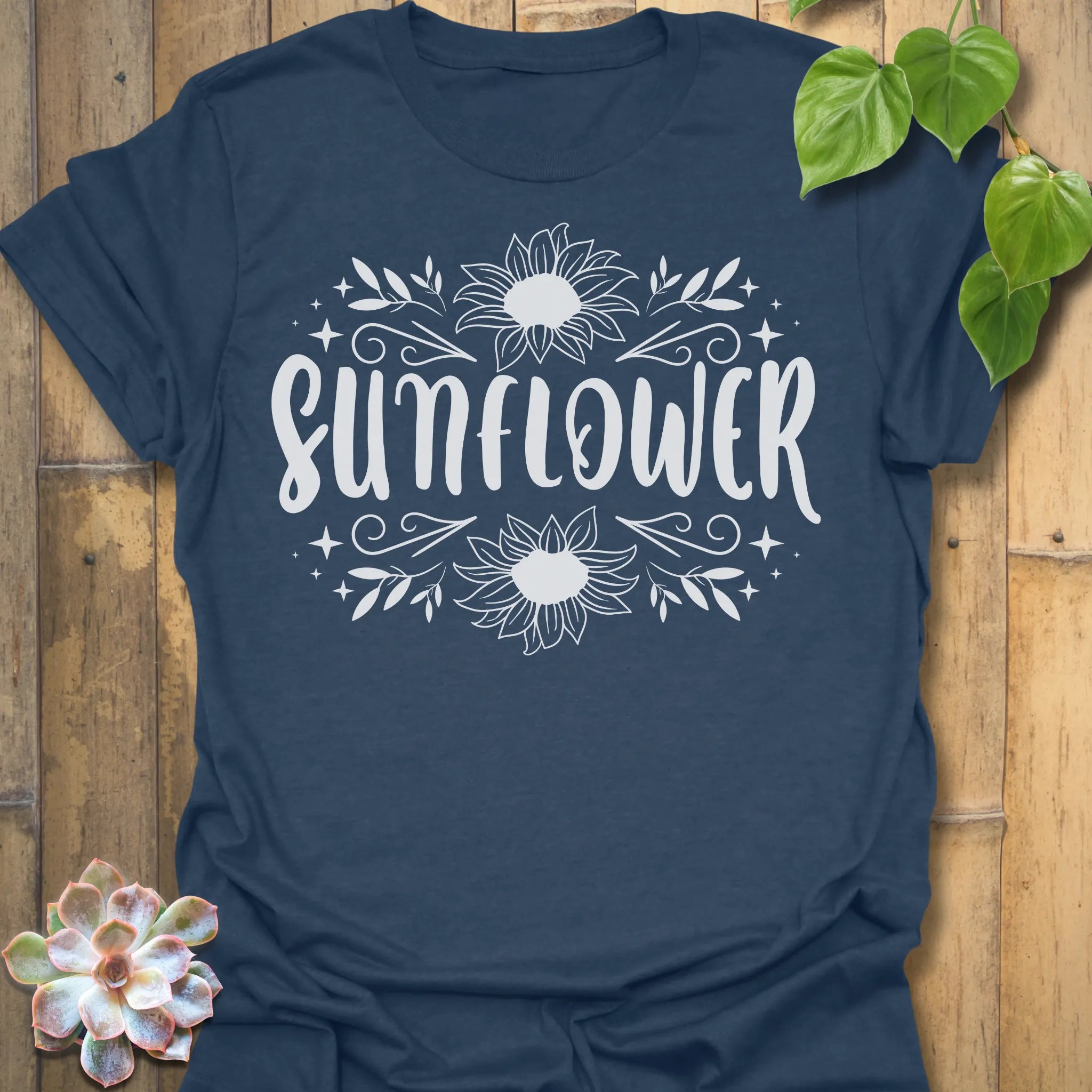 Heather Navy t-shirt featuring the design Sunflower printed inbold white, sunflower floral graphic tee.