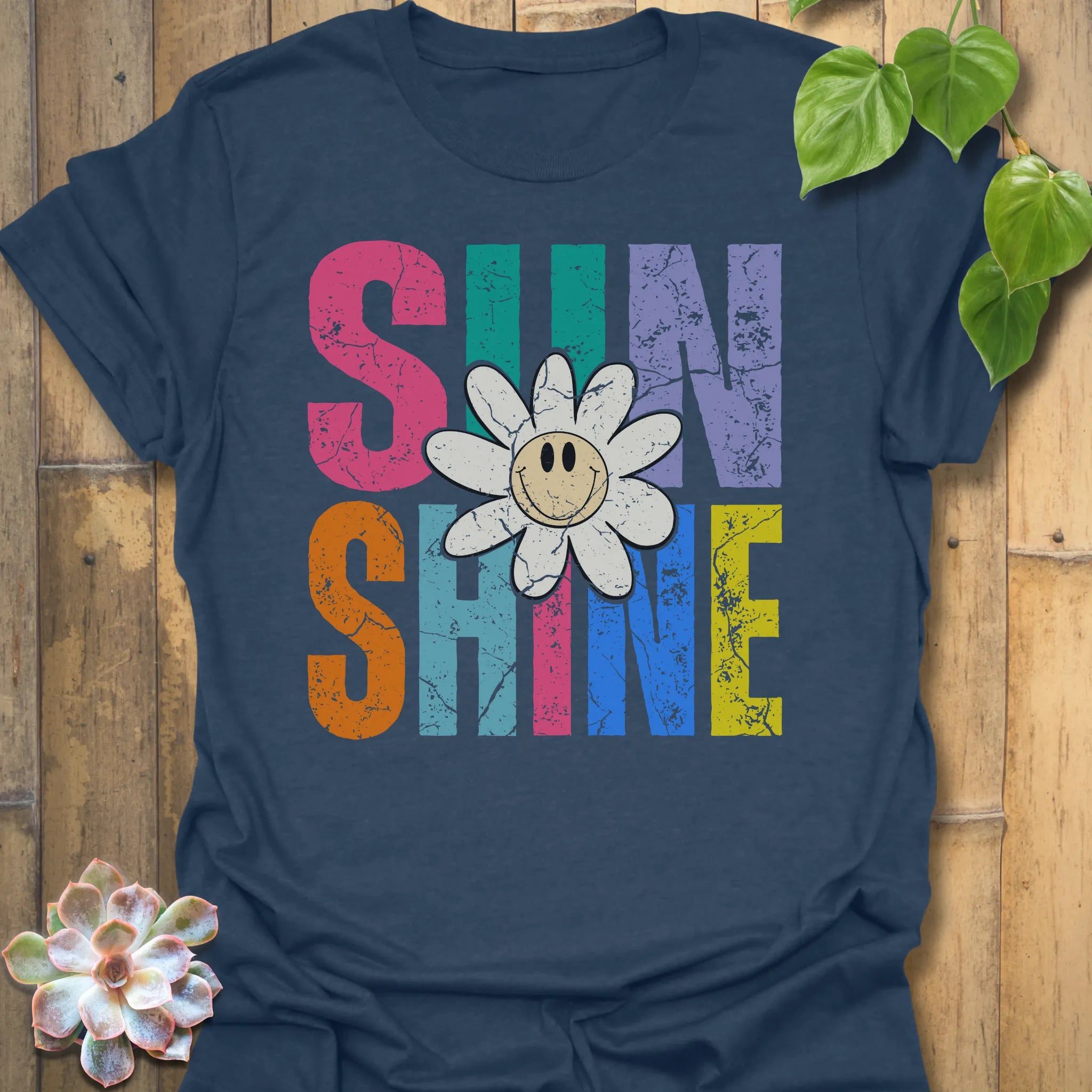Heather Navy t-shirt featuring the design Sunshine printed in bold colorful letters, funny sunflower casual summer shirt.