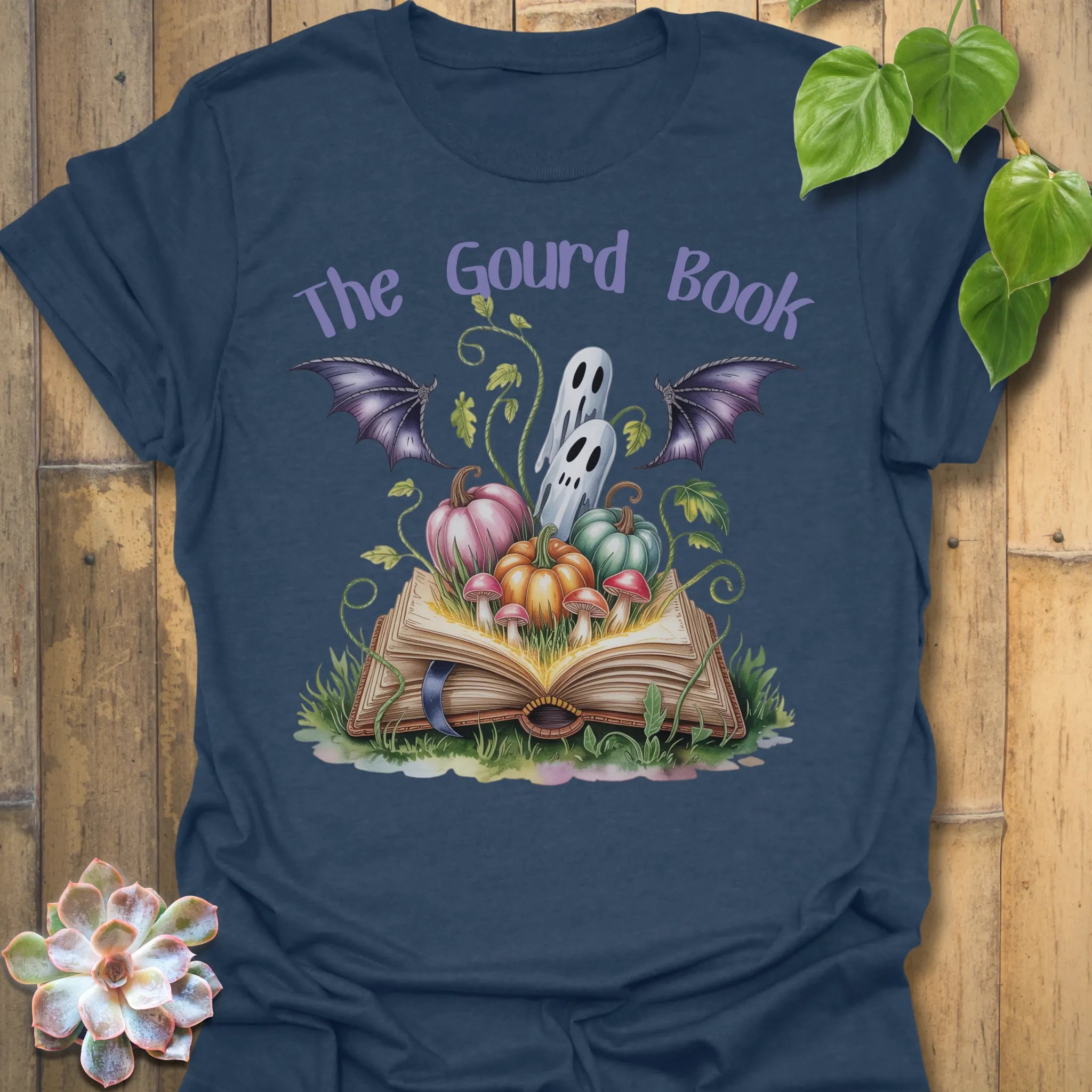 Heather Navy t-shirt featuring the design The Gourd Book printed in halloween pumpkin shirt.