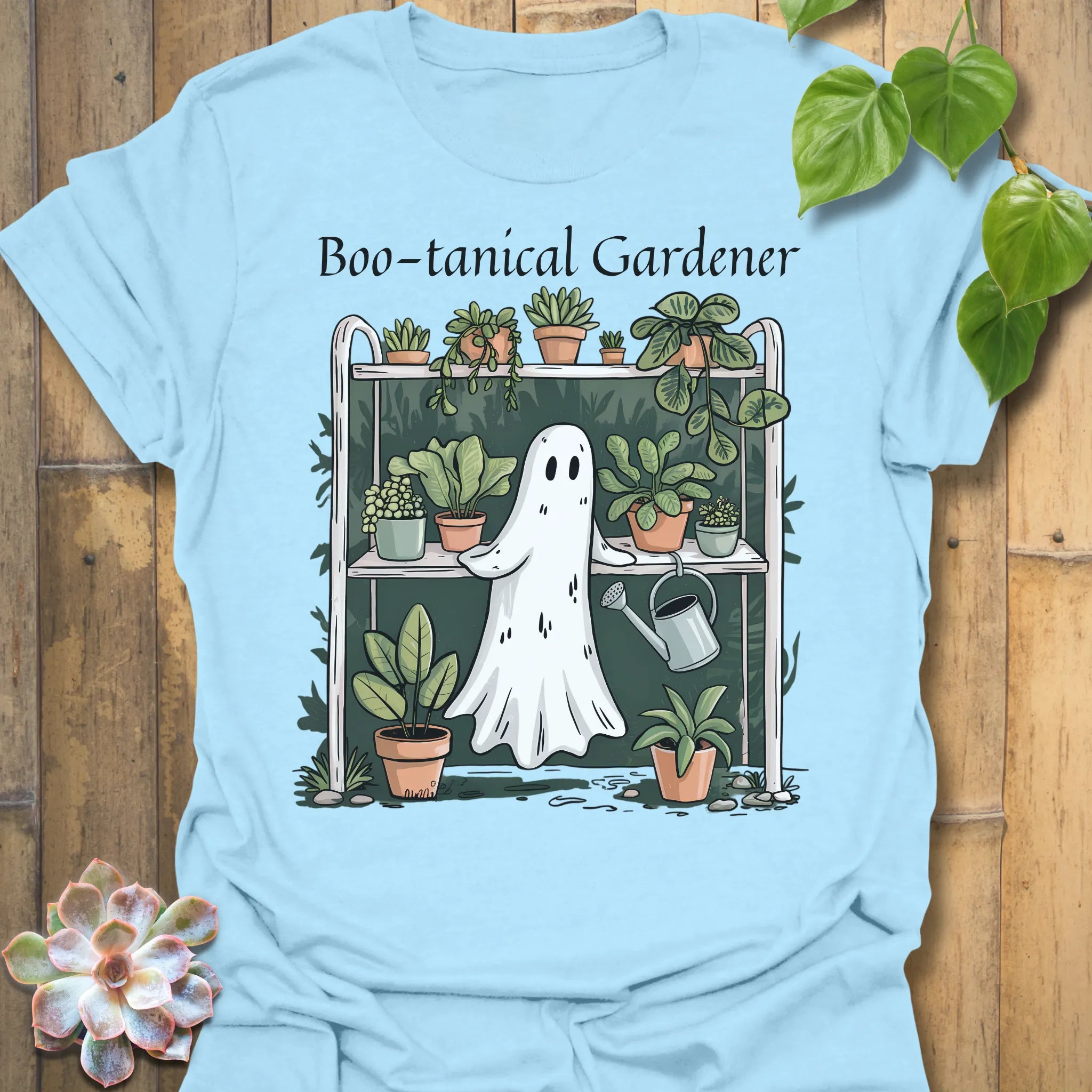 Light Blue t-shirt featuring the design Boo – Tanical Gardener printed in bold Halloween gardening shirt.