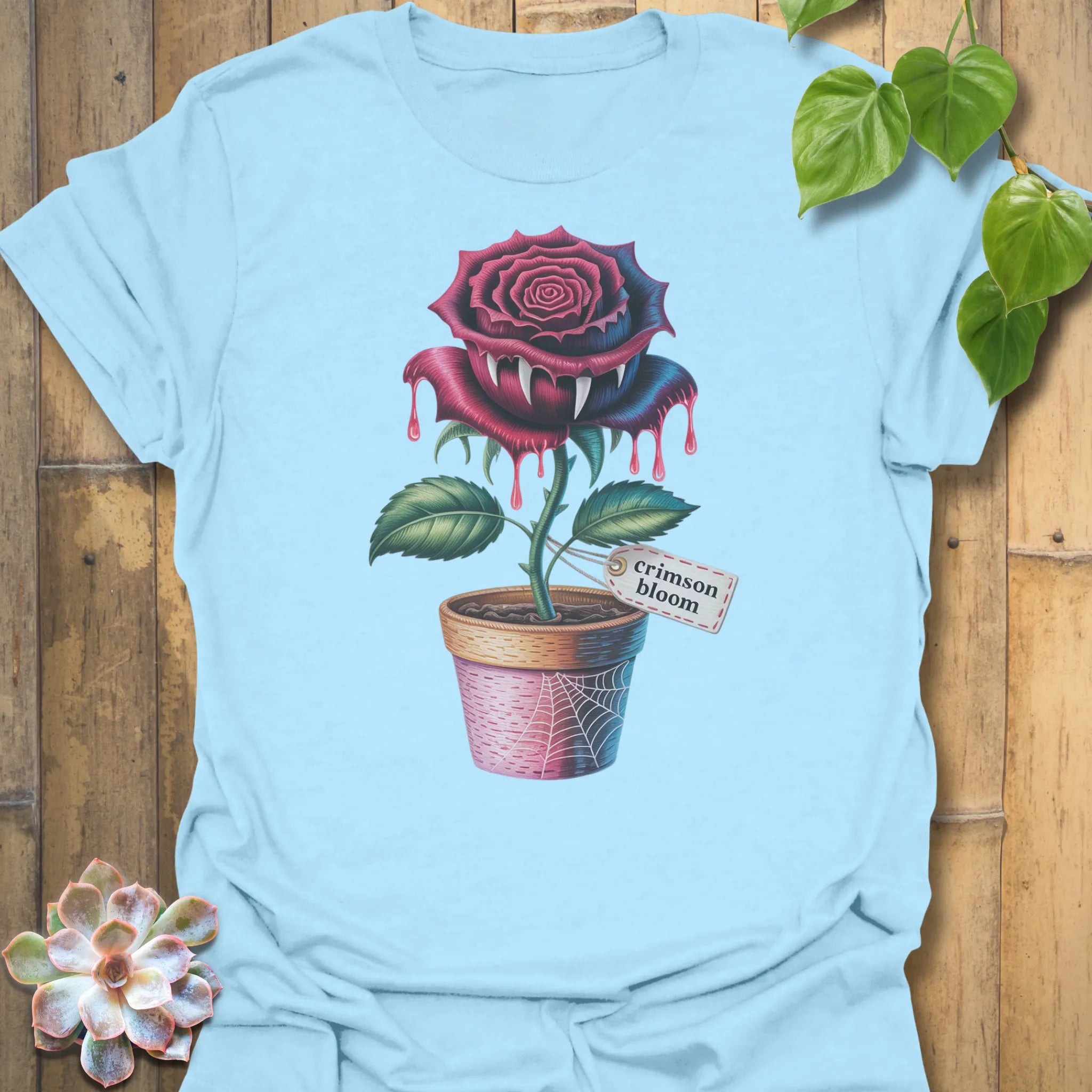 Light Blue t-shirt featuring the design Crimson Bloom printed in halloween floral graphic tee.