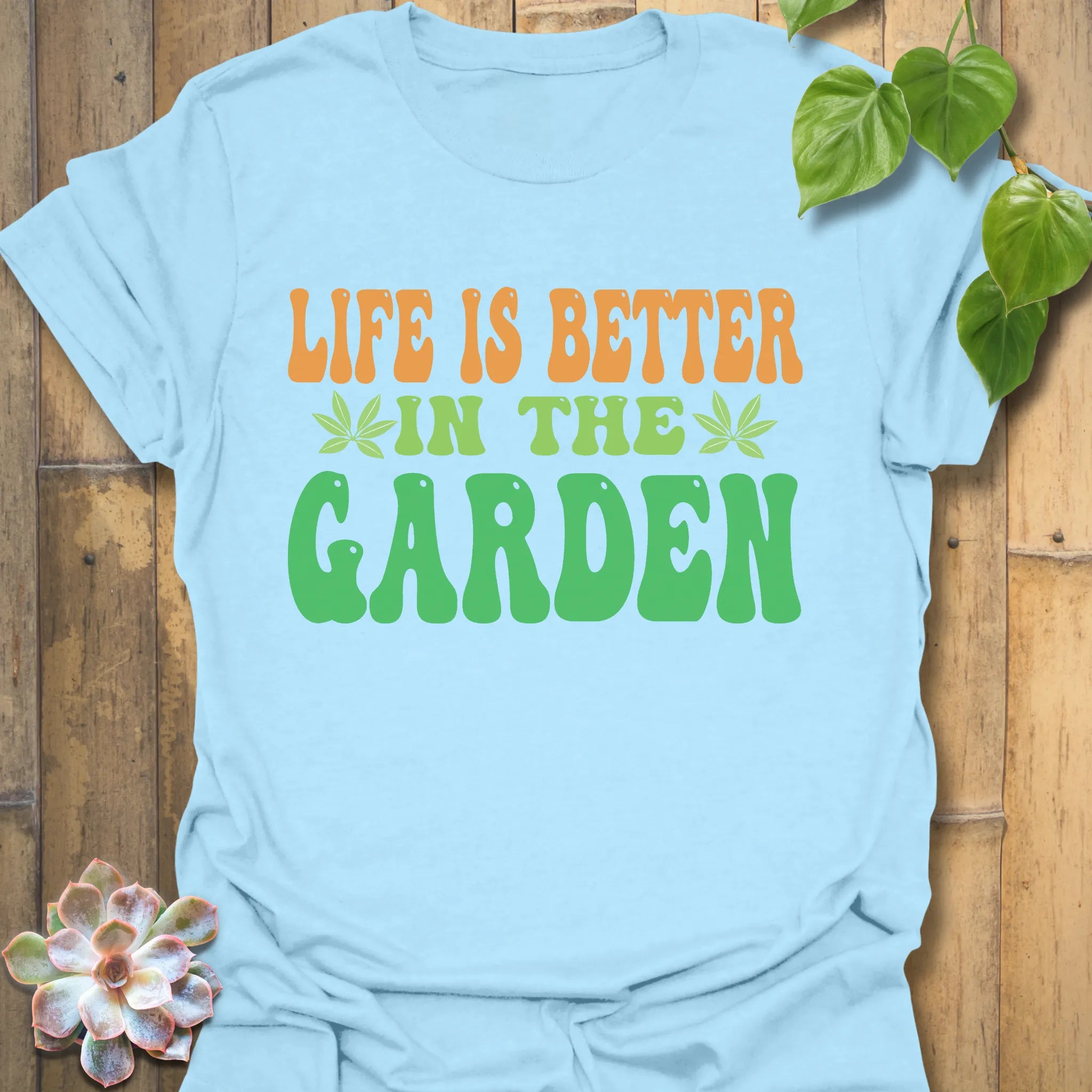 Light Blue t-shirt featuring the design Life Is Better printed in bold letters, positive vibes t-shirt.