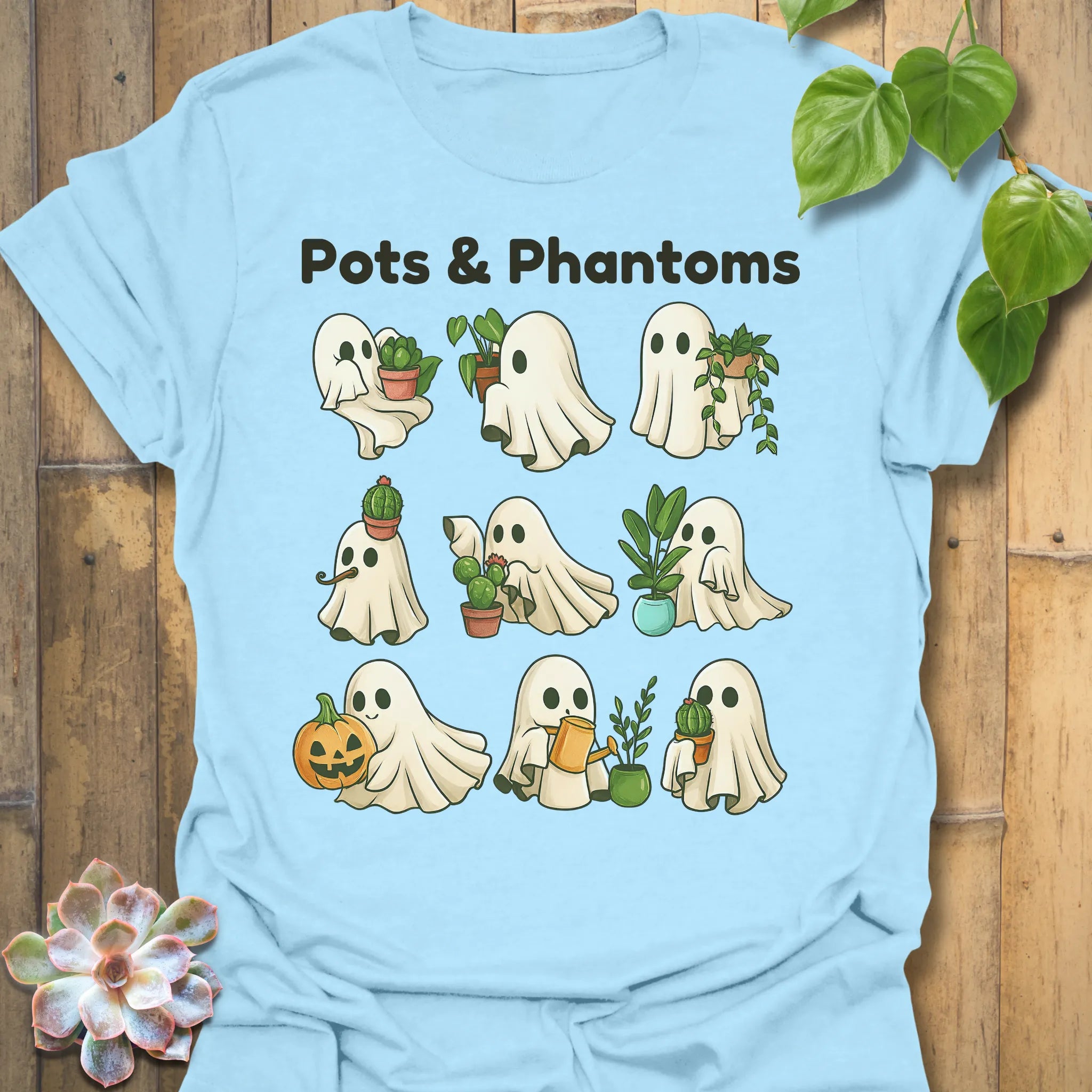 Light Blue t-shirt featuring the design Pots & Phantom printed in bold black letters, halloween graphic shirt