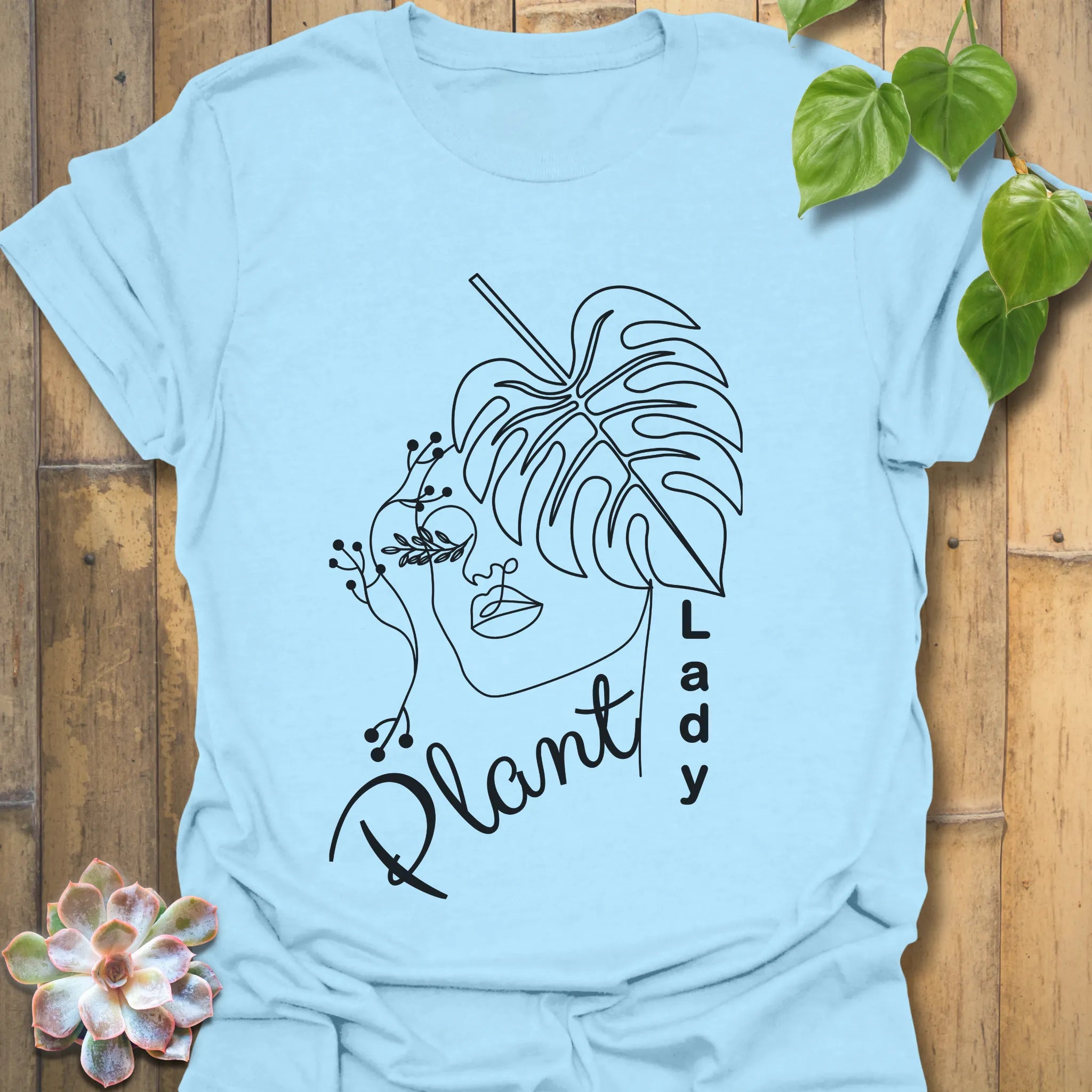 Light Blue t-shirt with the Plant Lady design, a fun choice for plant enthusiasts and garden lovers