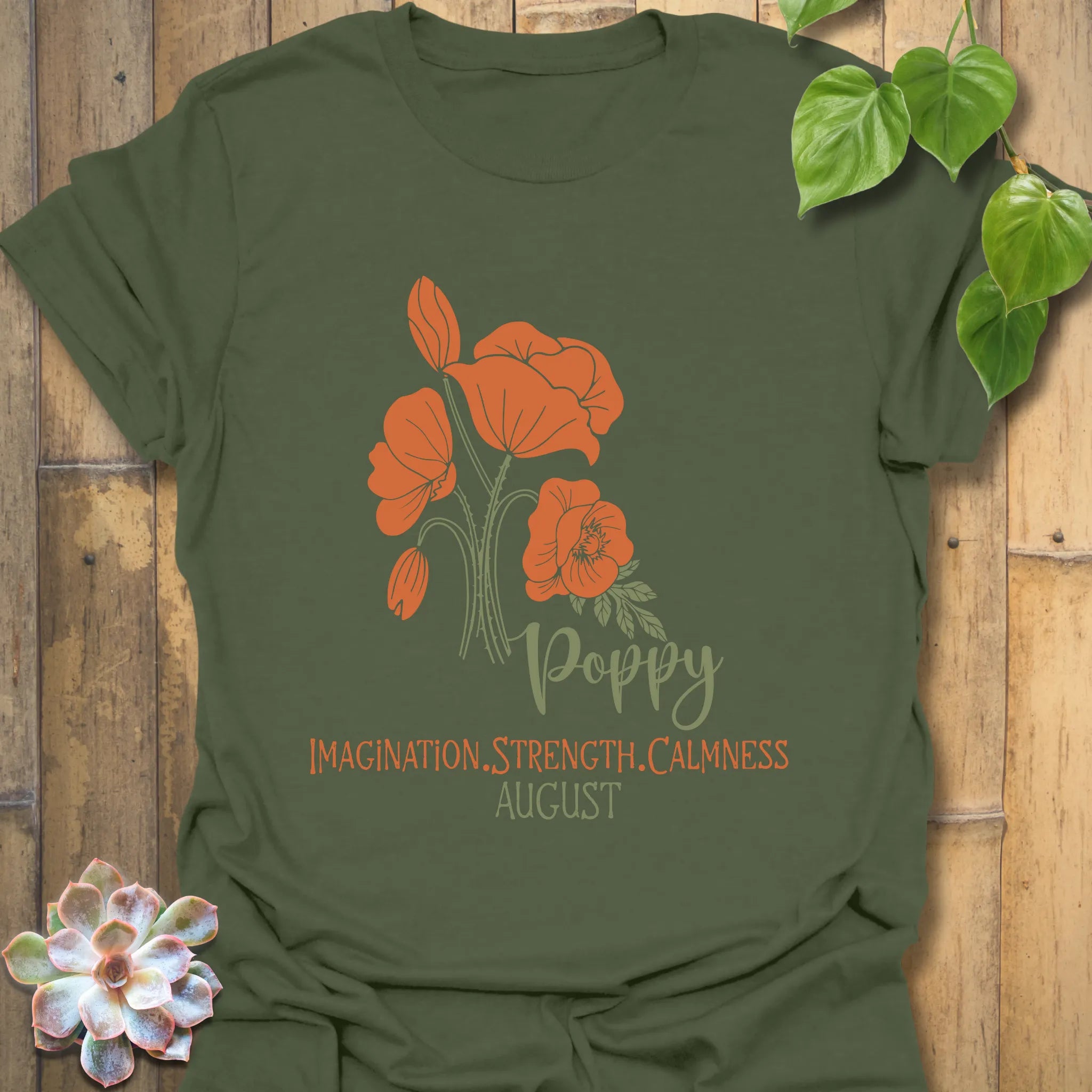 Military Green t-shirt featuring the design August Poppy with a floral print, a nature-inspired flower graphic tee for outdoor style.