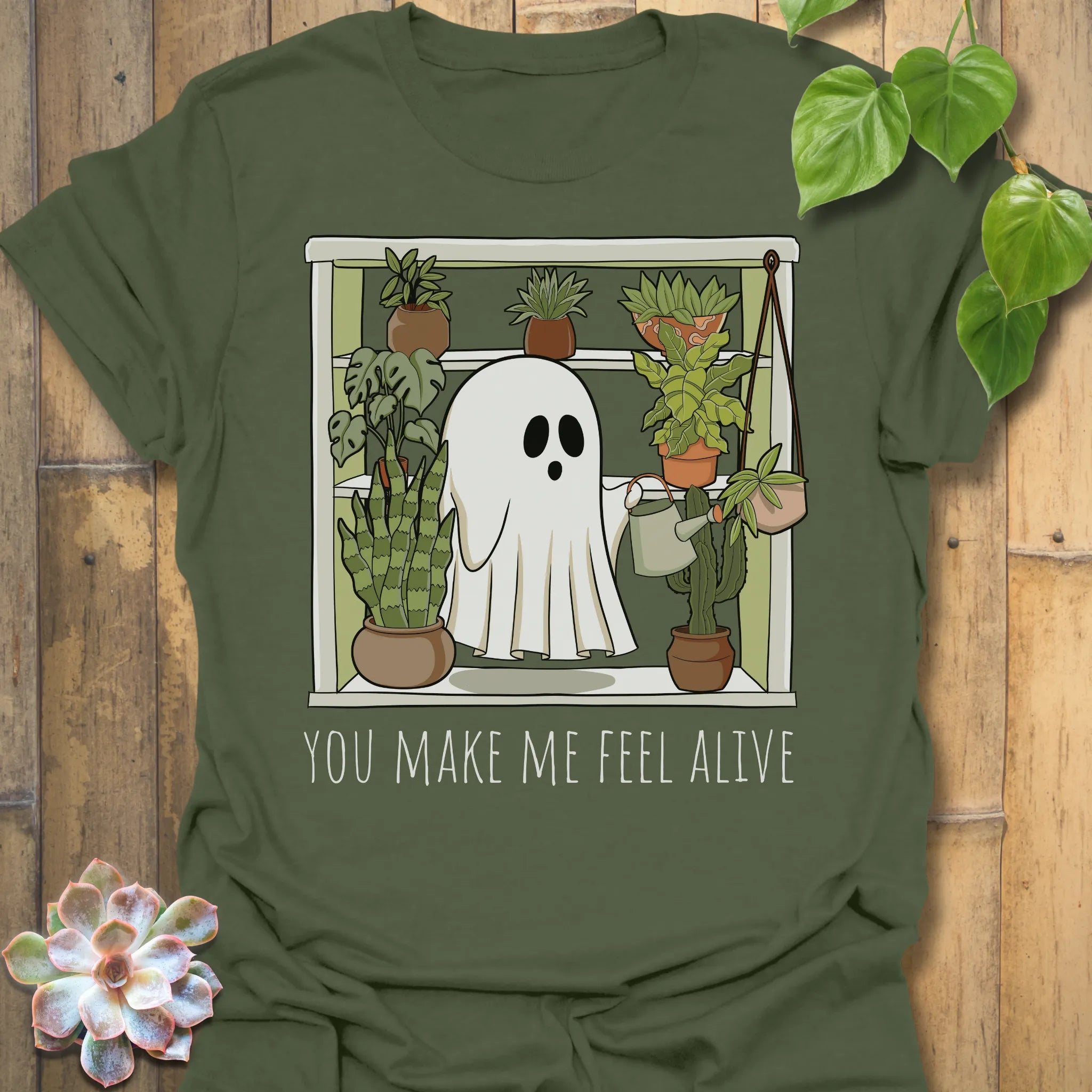 Military Green t-shirt featuring the design Feel Alive printed halloween motivational graphic tee.