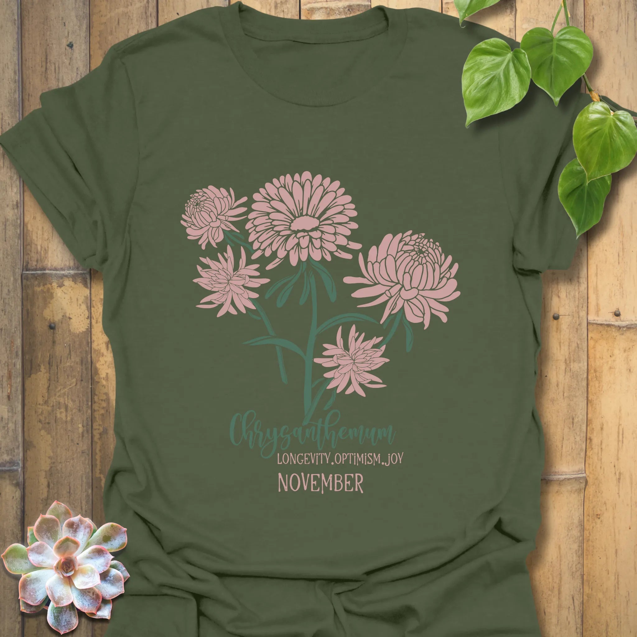 Military Green t-shirt featuring the design November Chrysanthemum with a chrysanthemum flower print, nature-inspired botanical tee for outdoor lovers.