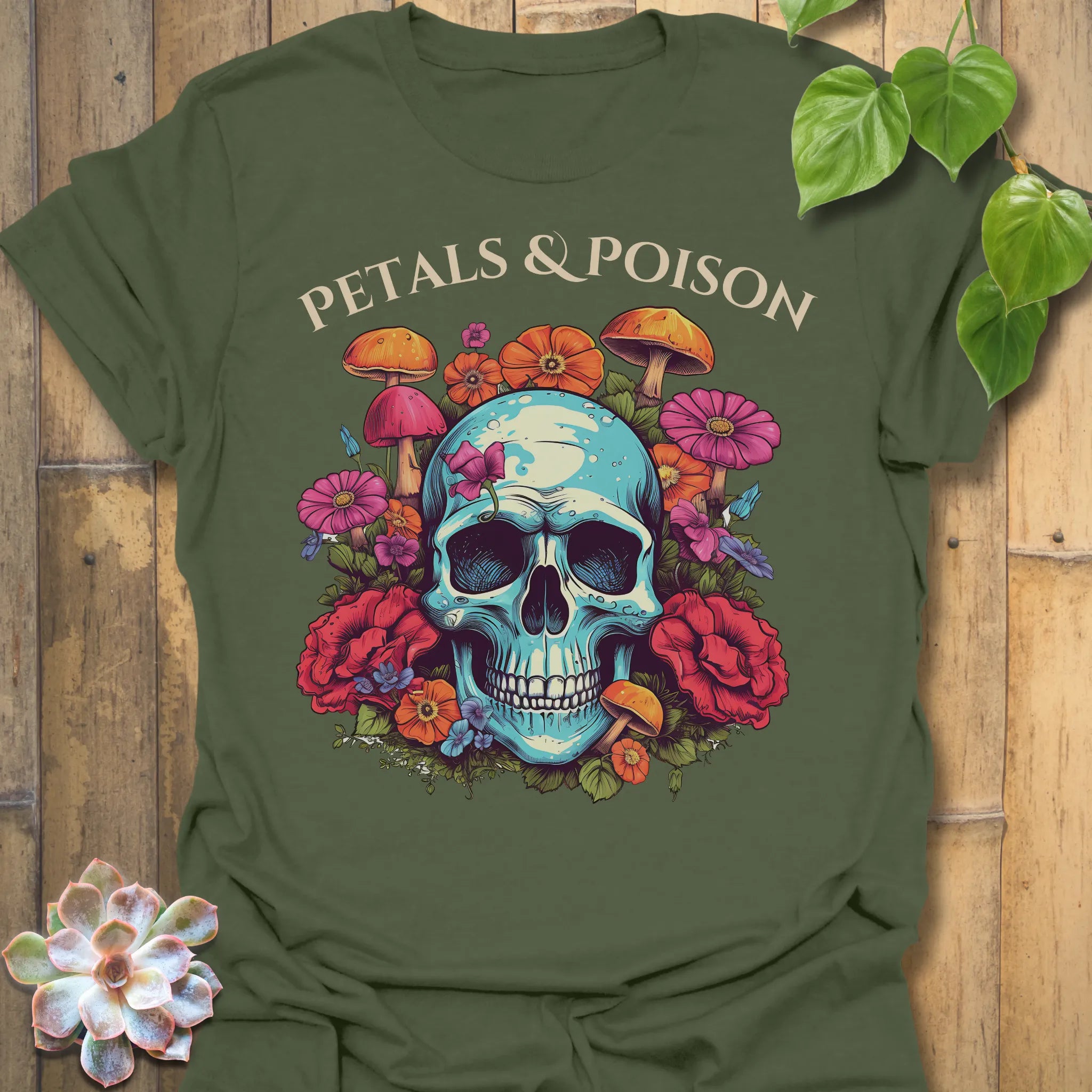 Military Green t-shirt featuring the design Petals & Poison printed in bold letters, gothic floral shirt.