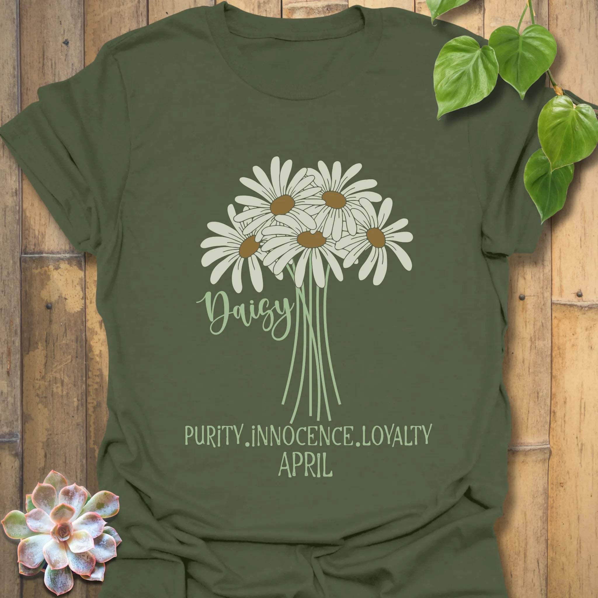 Military green t-shirt featuring the design April Daisy with a print of rose flower, a nature-inspired floral shirt for everyday wear.