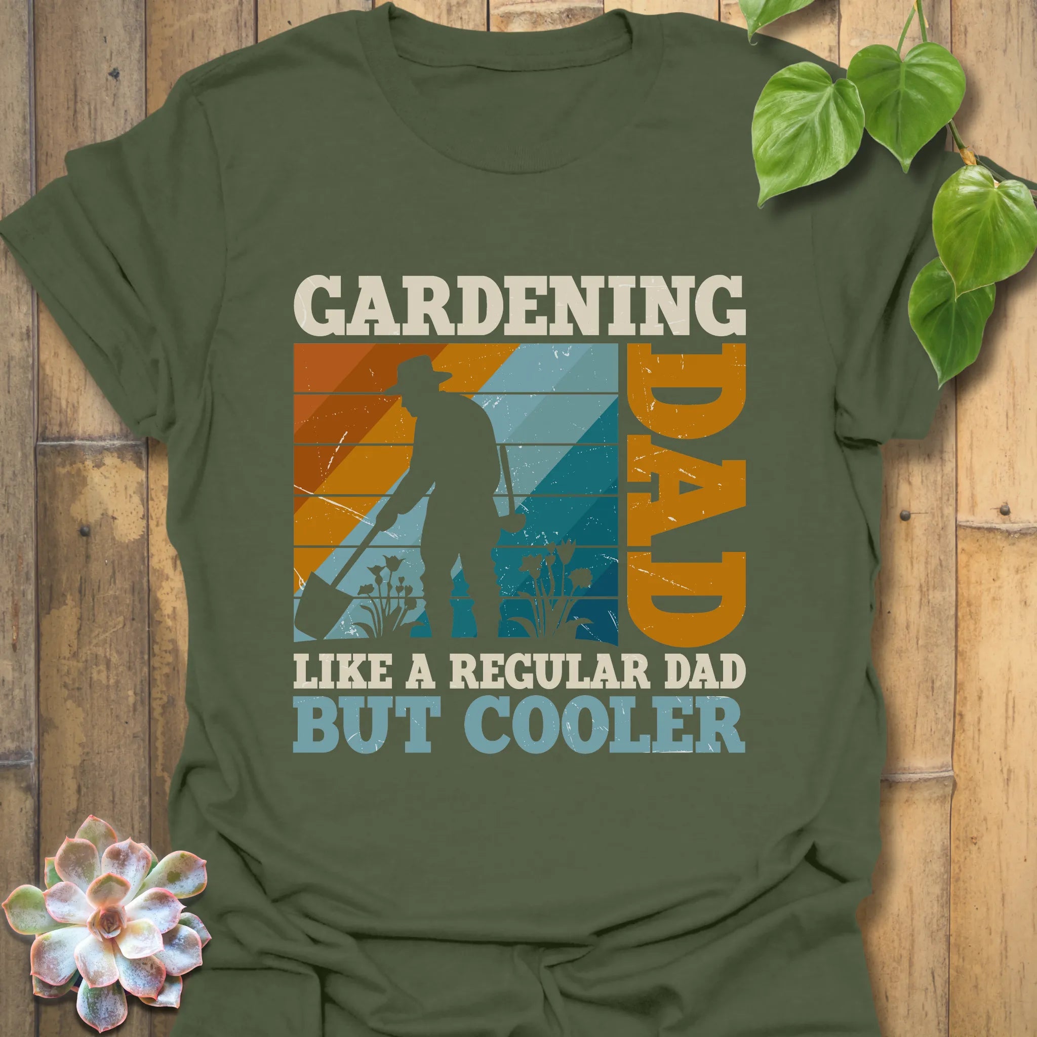 Military green t-shirt featuring the design Gardening Dad, Like a Regular Dad But Cooler, a funny garden-themed shirt for dads.