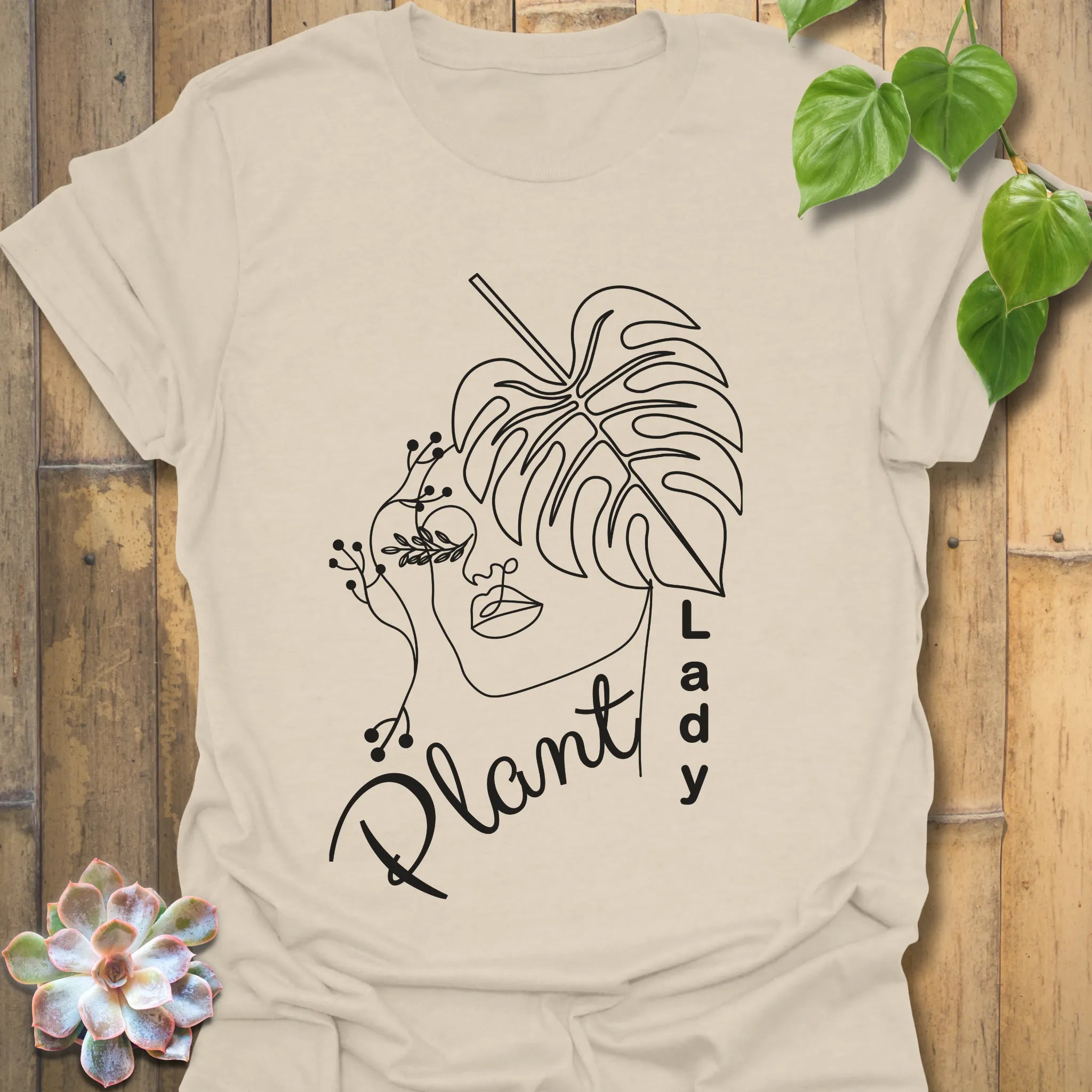 Natural colour t-shirt featuring the Plant Lady design, great for plant lovers and green thumbs