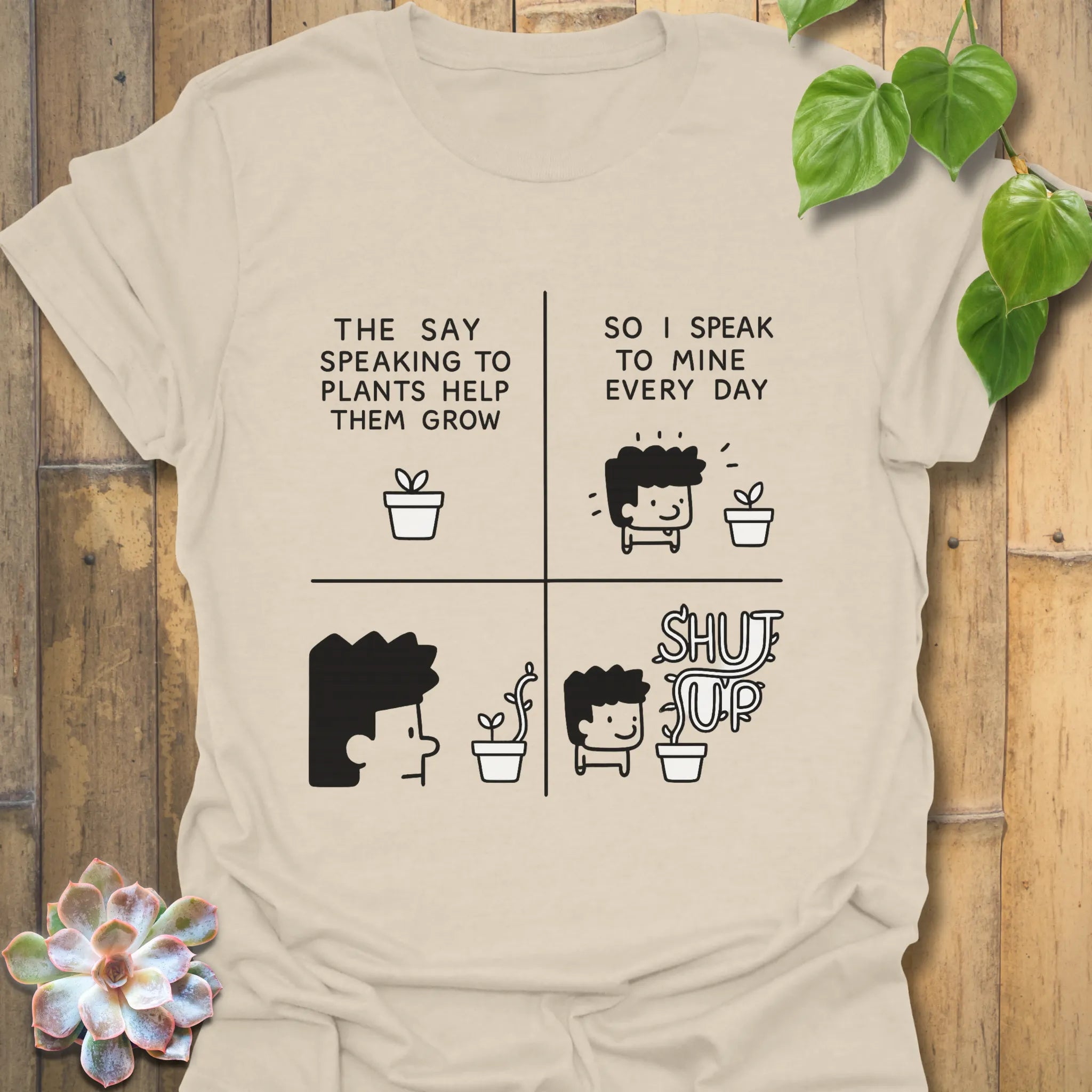 Natural t-shirt featuring the design “The say speaking to plants help them grow so I speak to mine everyday” with a funny character of a man and plants printed in bold colours
