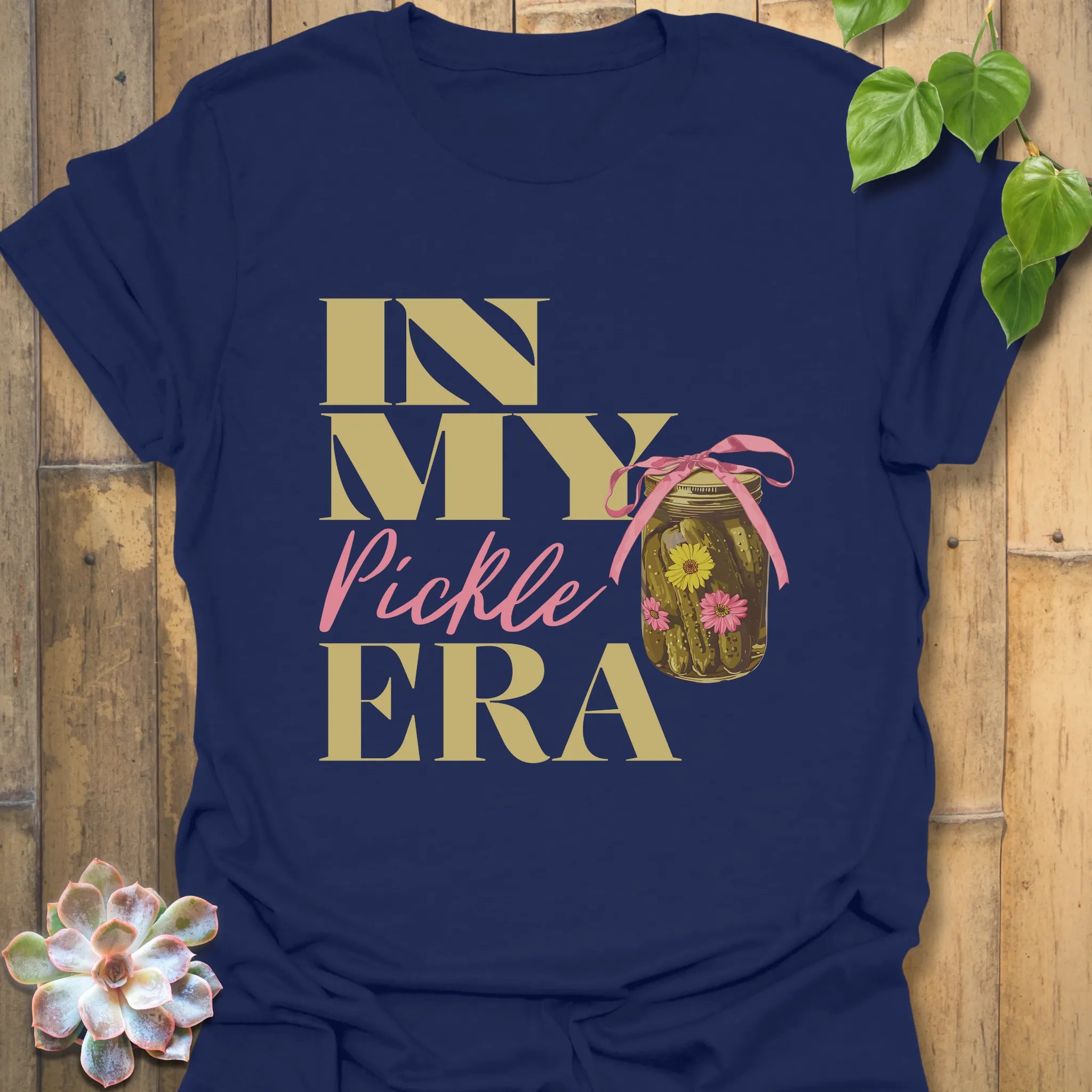Navy blue t-shirt with the design “In My Pickle ERA” showing cucumbers in a jar