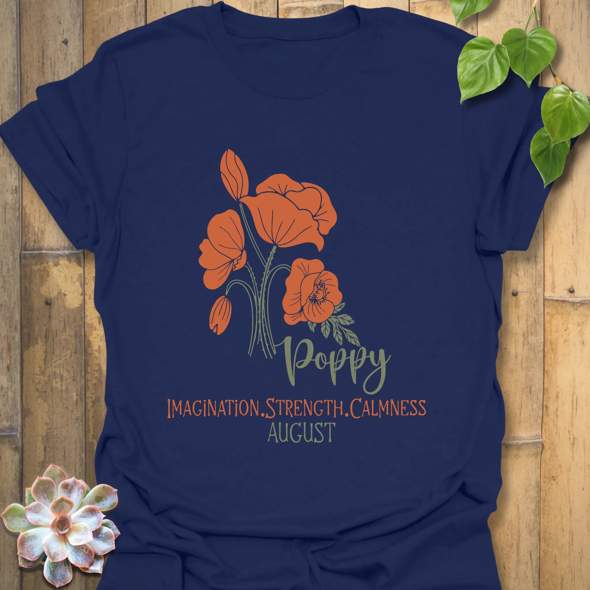 Navy t-shirt featuring the design August Poppy with a floral print, a classic flower graphic tee for casual and trendy outfits.