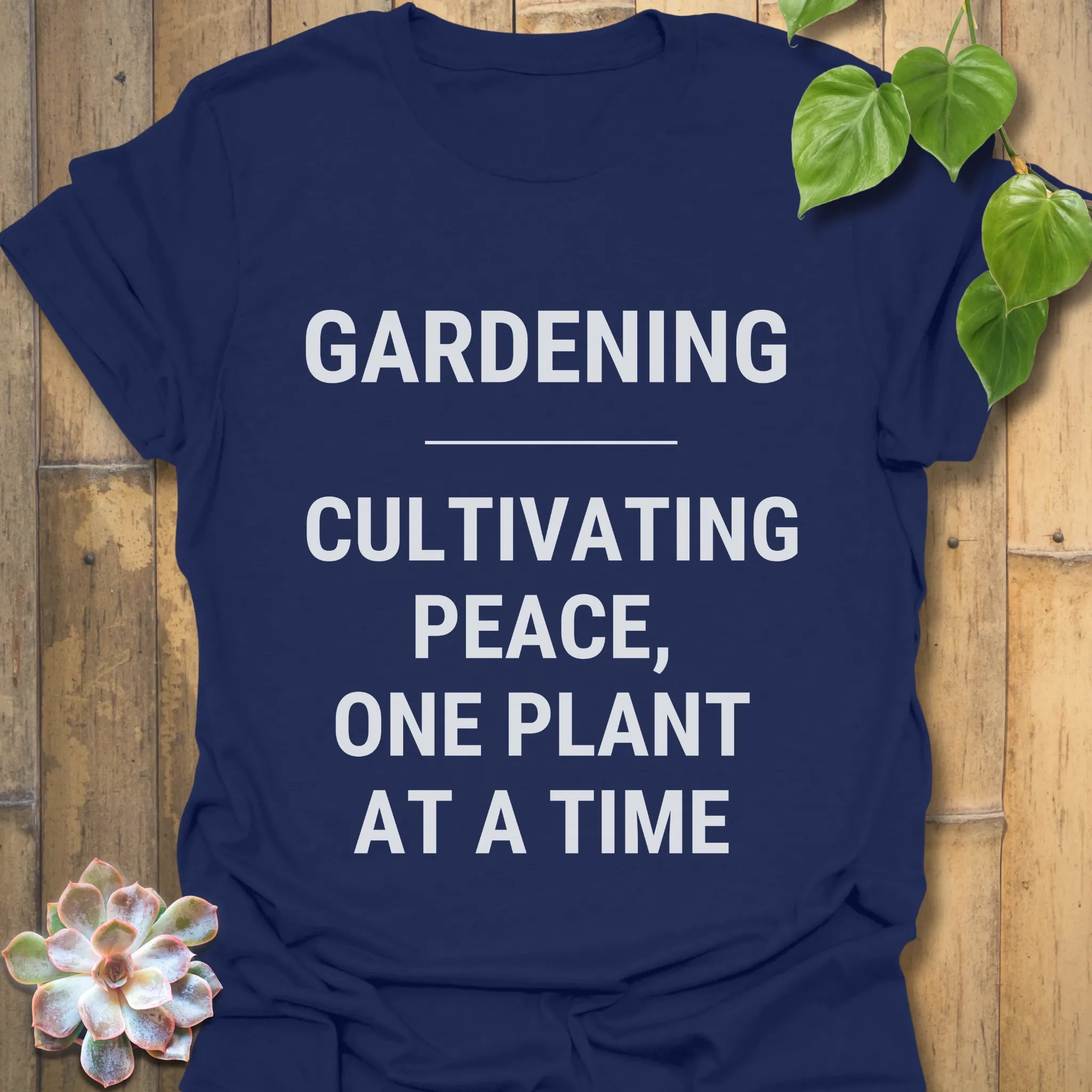 Navy t-shirt featuring the design Gardening Cultivating Peace One Plant at a Time, eco garden shirt.