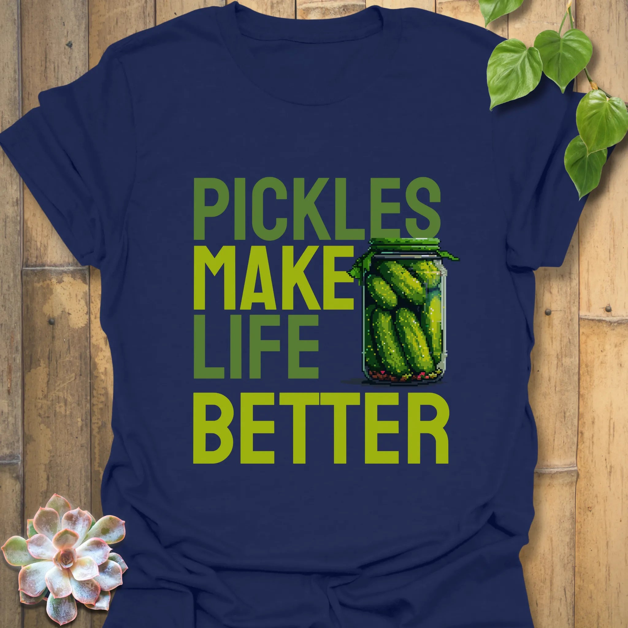 Navy t-shirt featuring the design “Pickles make life better” with cucumbers inside a glass jar