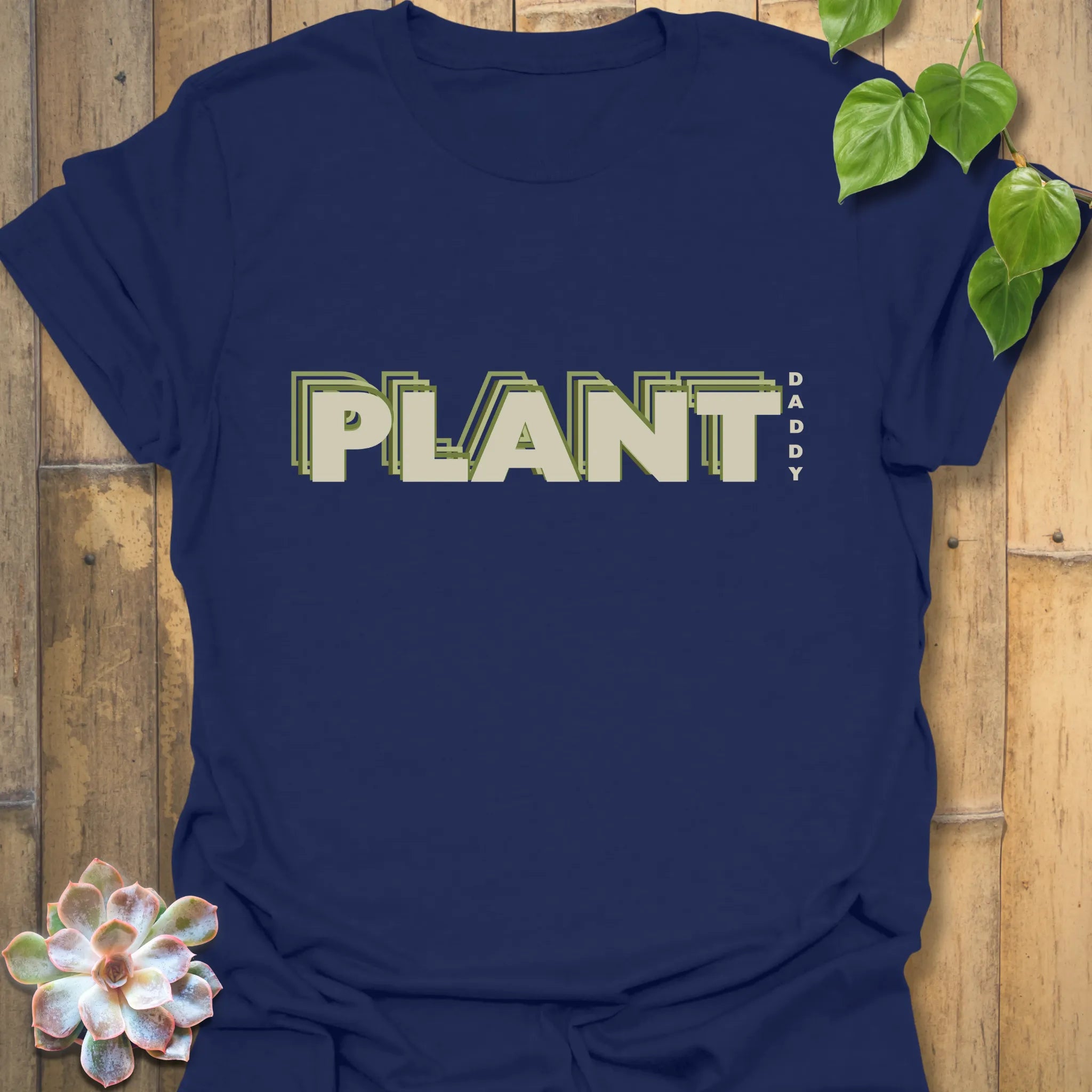 Navy t-shirt featuring the design Plant Dad, trendy shirt for gardeners and plant dads.