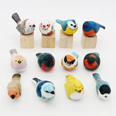 Artisan bird statues