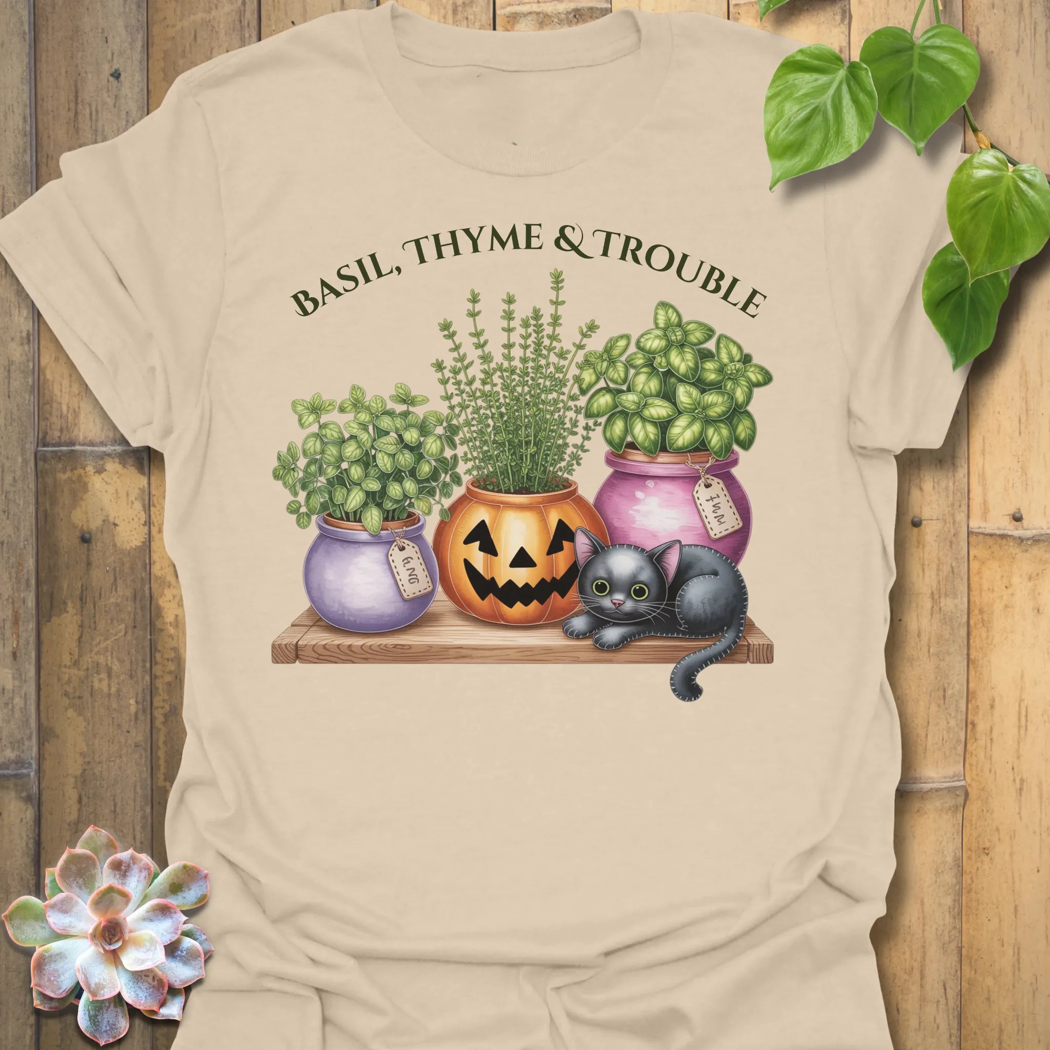 Sand t-shirt featuring the design Basil, Thyme & Trouble printed in bold letters, plant and herb lover tee.
