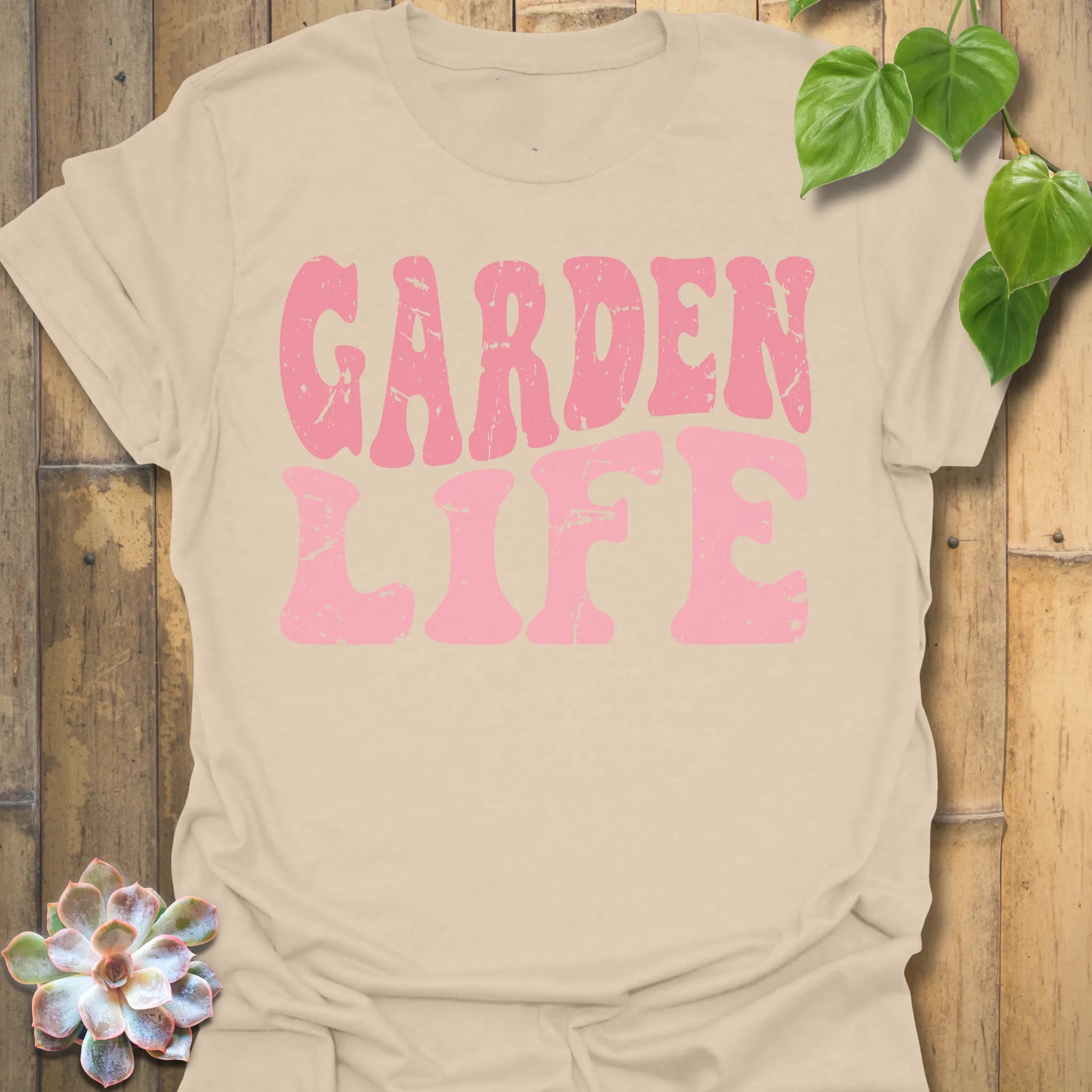 Sand t-shirt featuring the design Garden Life printed in bold letters, garden lover shirt.
